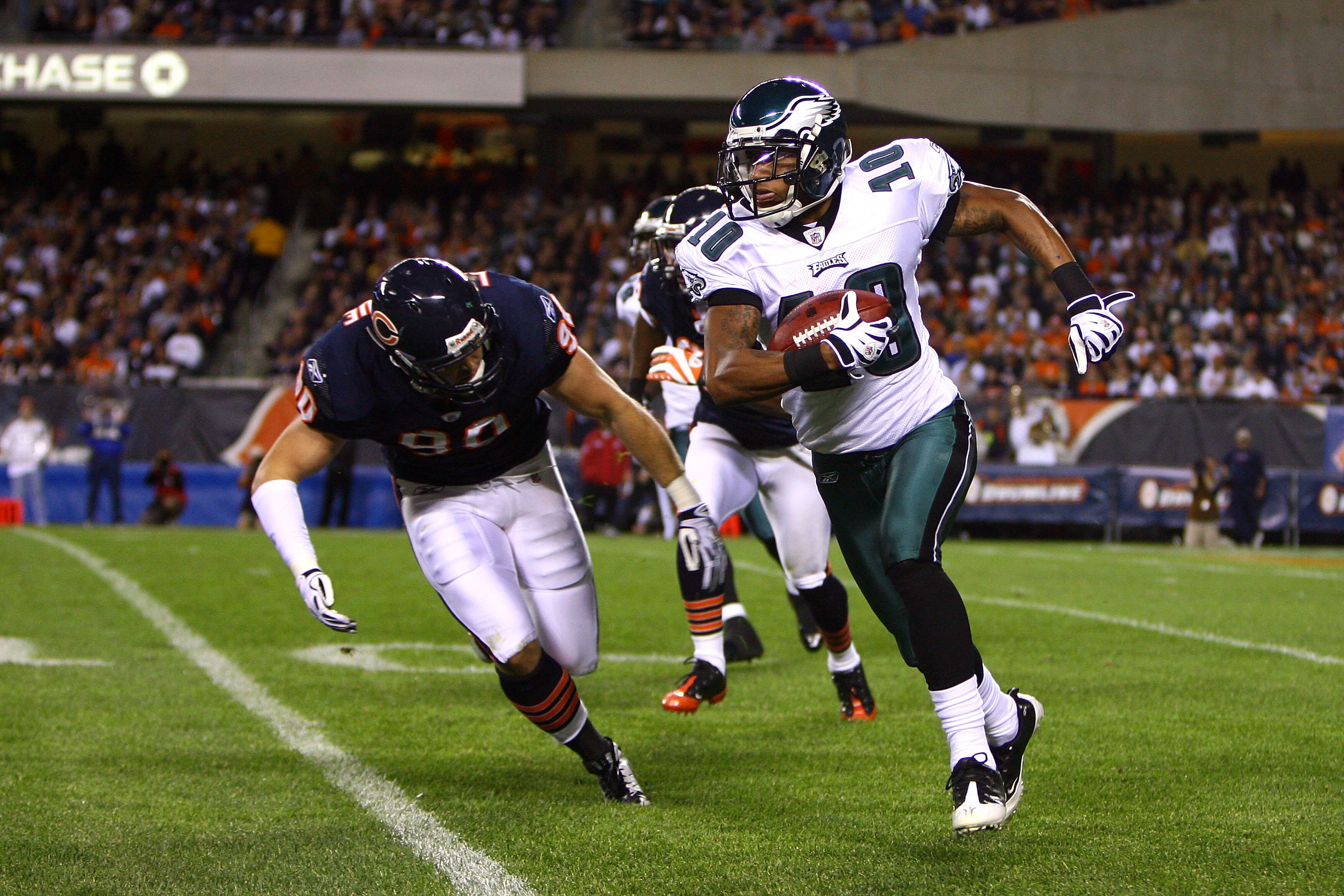 CHICAGO - SEPTEMBER 28:  DeSean Jackson #10 of the Philadelphia Eagles runs for yards after the catch against Joey LaRocque #90 of the Chicago Bears at Soldier Field on September 28, 2008 in Chicago, Illinois.  (Photo by Jeff Gross/Getty Images)