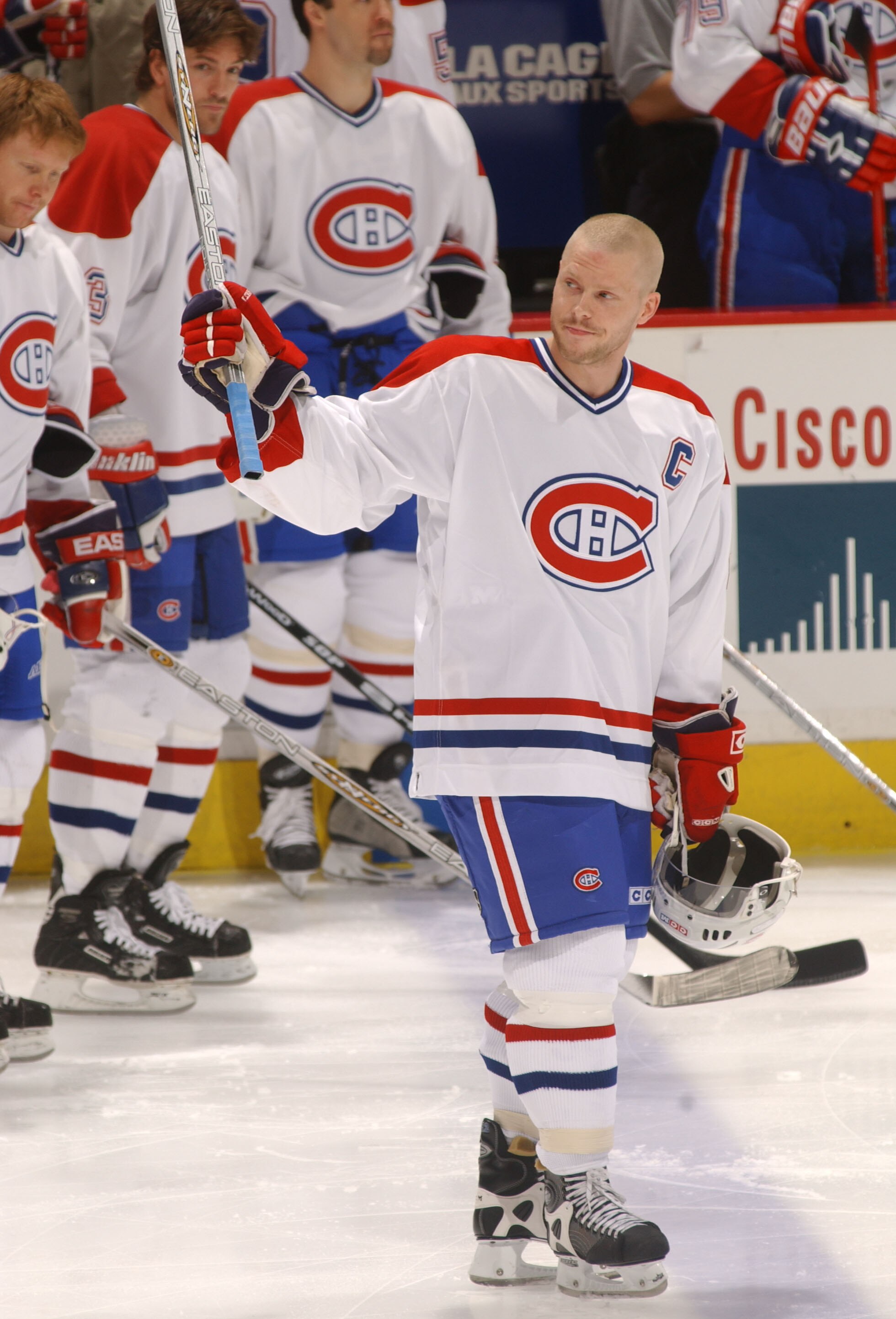 9 Apr 2002:  Saku Koivu #11 of the Montreal Canadiens waves to the crowd as he recieves a standing ovation at the start of the game against the Ottowa Senators at the Molson Centre in Montreal, Canada. DIGITAL IMAGE Mandatory credit: Dave Sandford/GettyIm