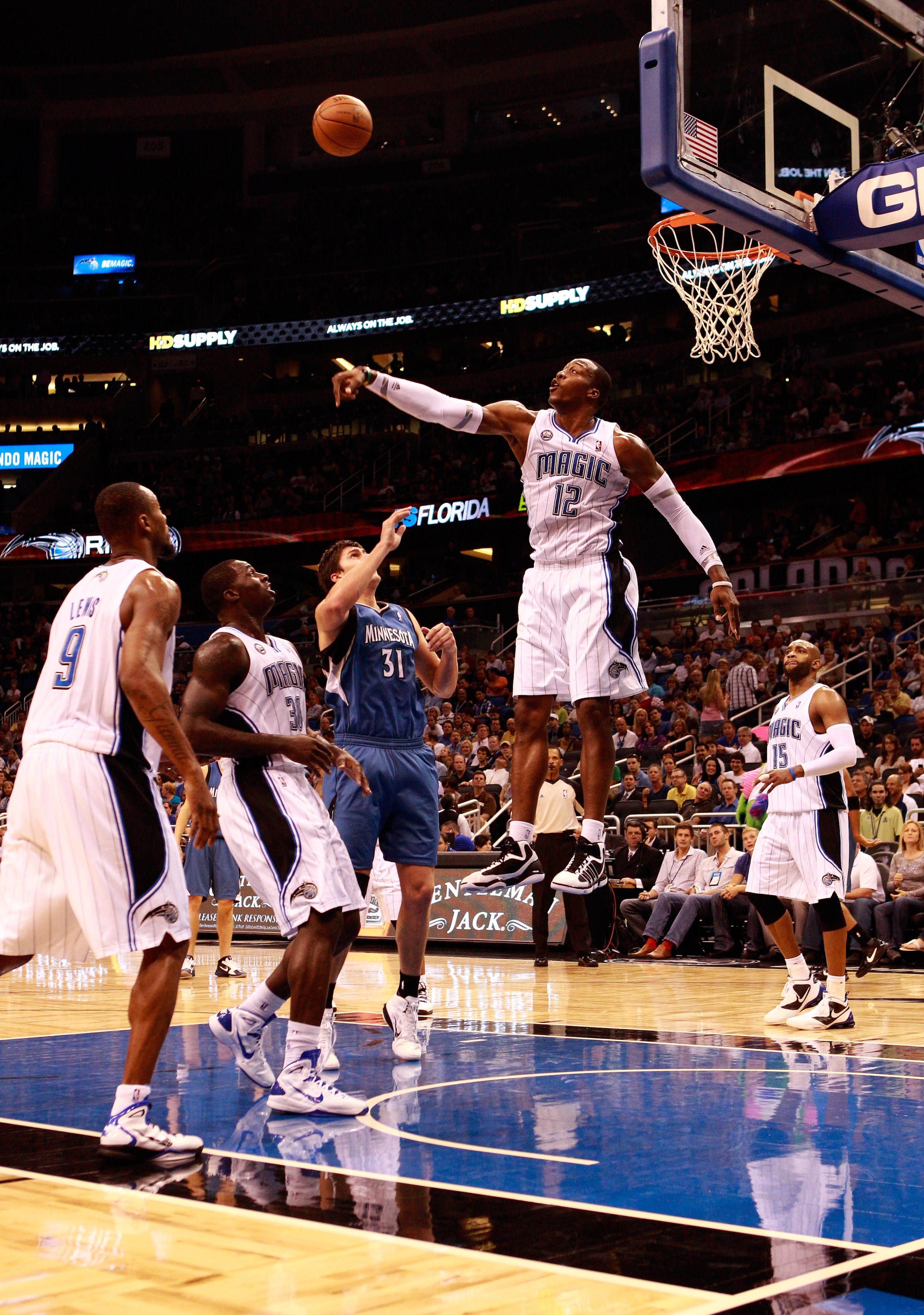 ORLANDO, FL - NOVEMBER 03:  Dwight Howard #12 of the Orlando Magic blocks the shot of Darko Milicic #31 of the Minnesota Timberwolves during the game at Amway Arena on November 3, 2010 in Orlando, Florida.  NOTE TO USER: User expressly acknowledges and ag