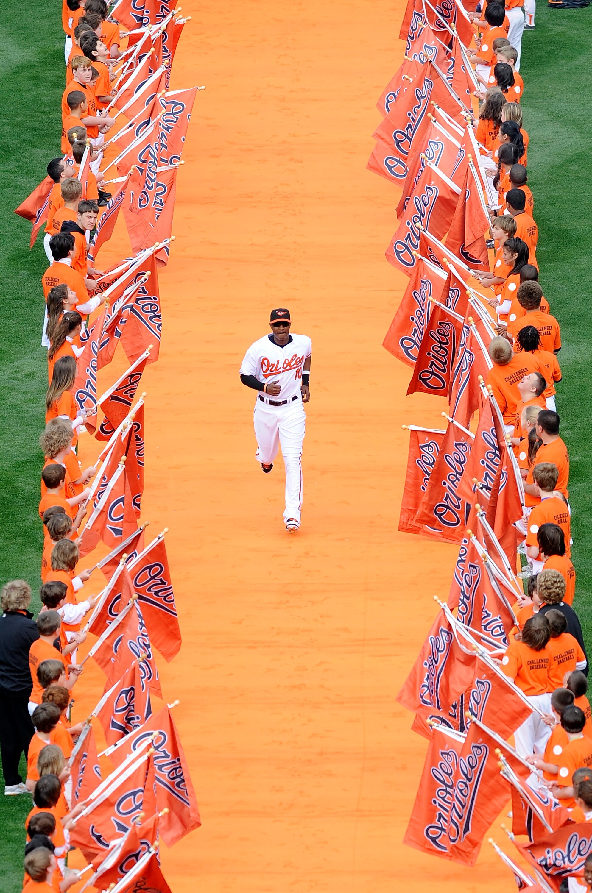 BALTIMORE - APRIL 09:  Adam Jones #10 of the Baltimore Orioles is introduced before the game against the Toronto Blue Jays on Opening Day at Camden Yards on April 9, 2010 in Baltimore, Maryland.  (Photo by Greg Fiume/Getty Images)
