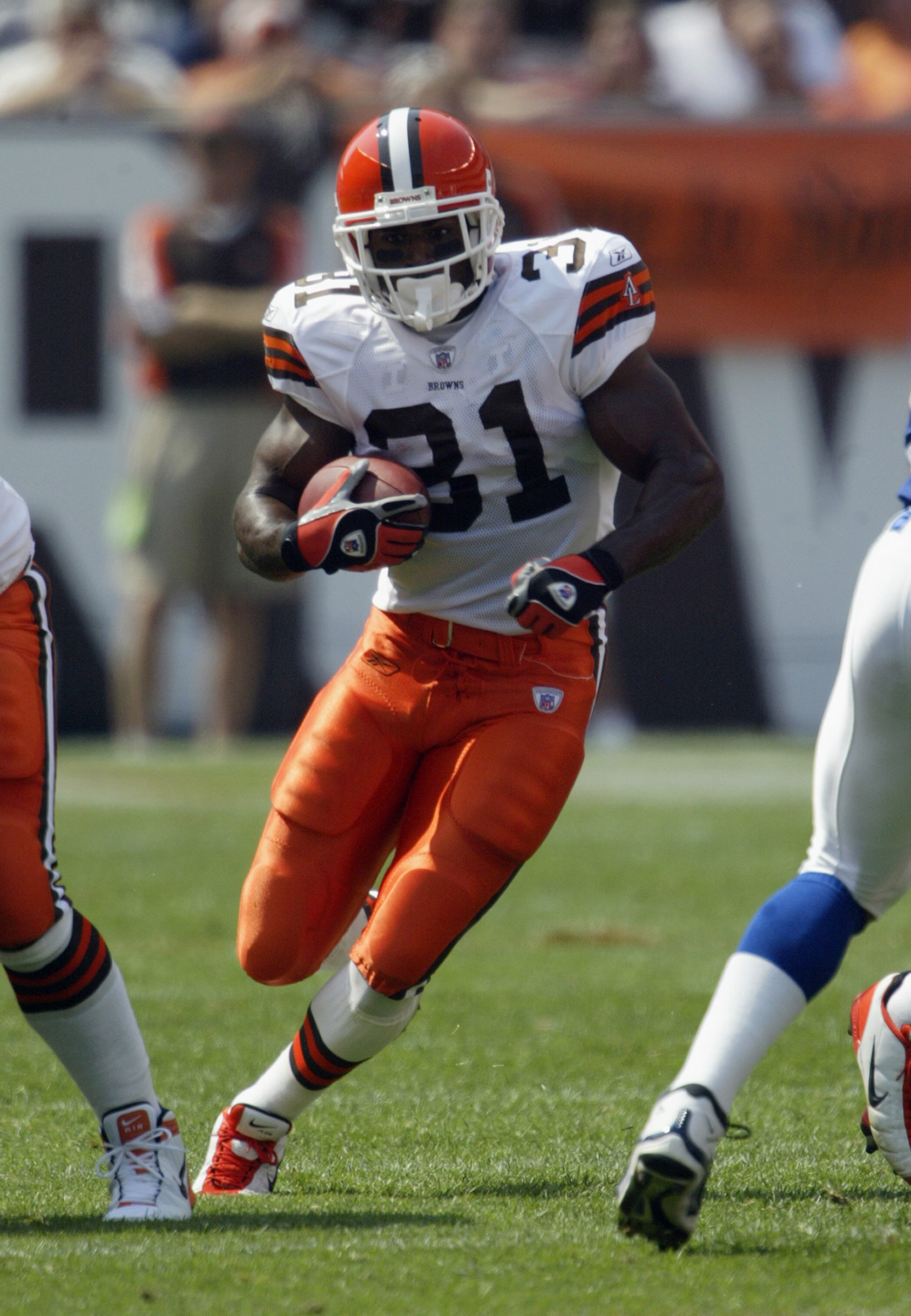 CLEVELAND- SEPTEMBER 7:  Running back William Green #31 of the Cleveland Browns runs the  ball up the middle against the Indianapolis Colts on September 7, 2003 at Cleveland Browns Stadium in Cleveland, Ohio. The Colts defeated the Browns 9-6. (Photo by T