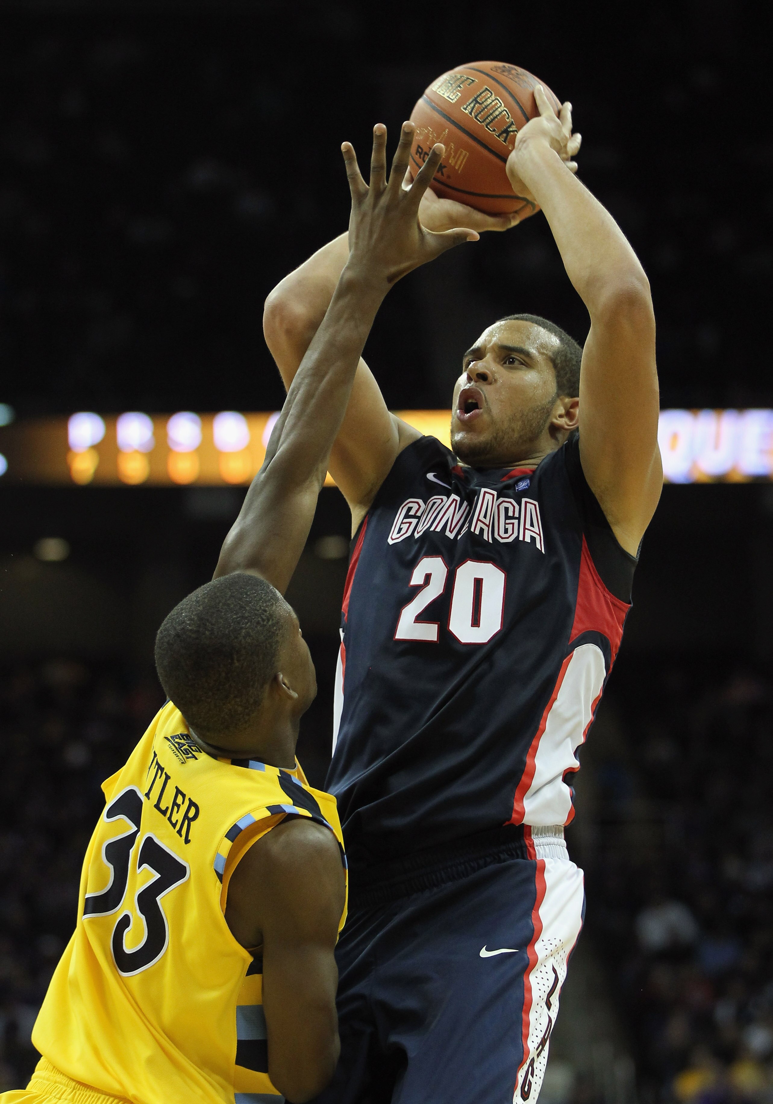 KANSAS CITY, MO - NOVEMBER 23:  Elias Harris #20 of the Gonzaga Bulldogs shoots over Jimmy Butler #33 of the Marquette Golden Eagles during the CBE Classic consolation game on November 23, 2010 at the Sprint Center in Kansas City, Missouri.  (Photo by Jam