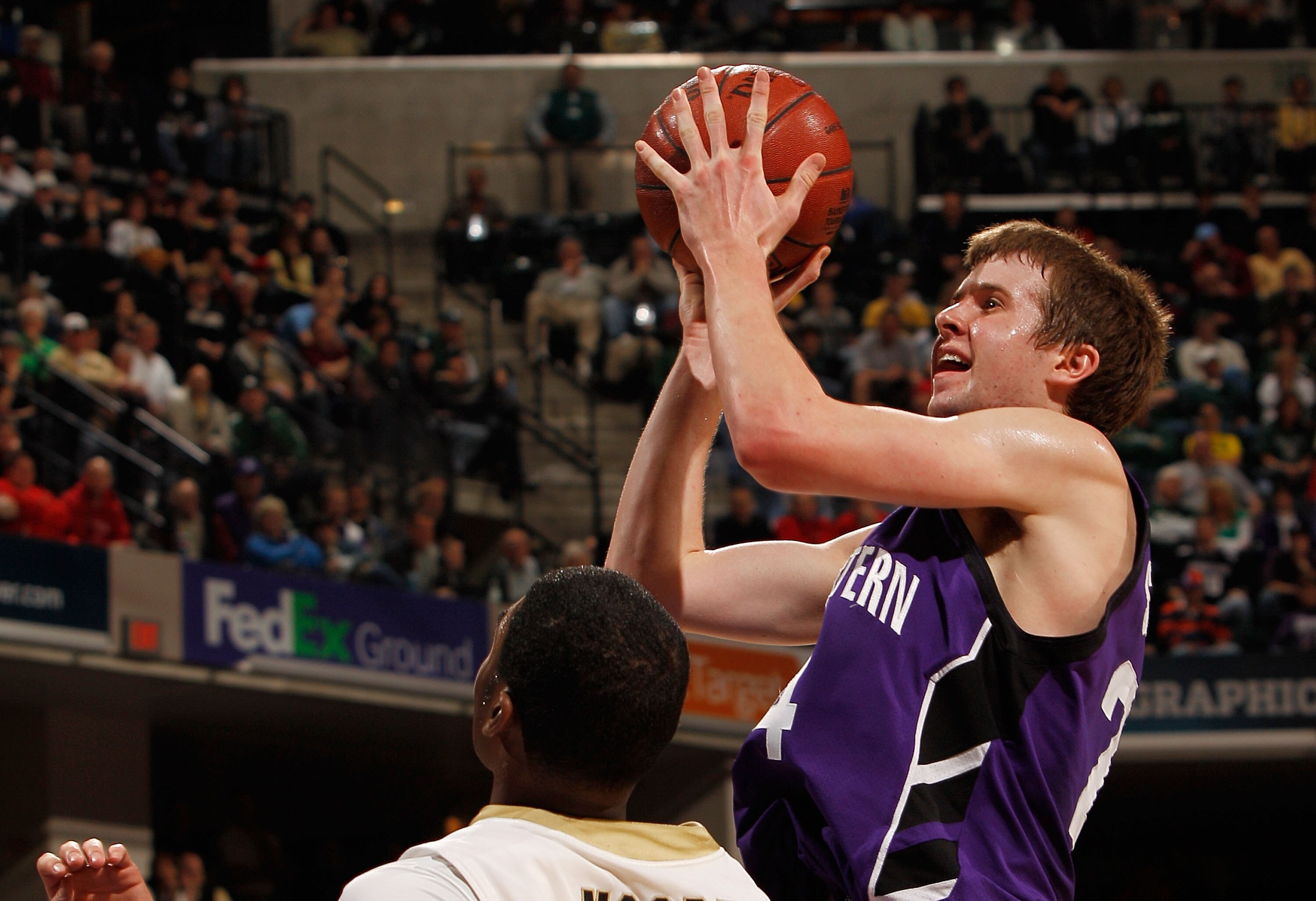 INDIANAPOLIS - MARCH 12:  Forward John Shurna #24 of the Northwestern Wildcats go up for a shot during the quarterfinal game against the Purdue Boilermakers in the Big Ten Men's Basketball Tournament at Conseco Fieldhouse on March 12, 2010 in Indianapolis