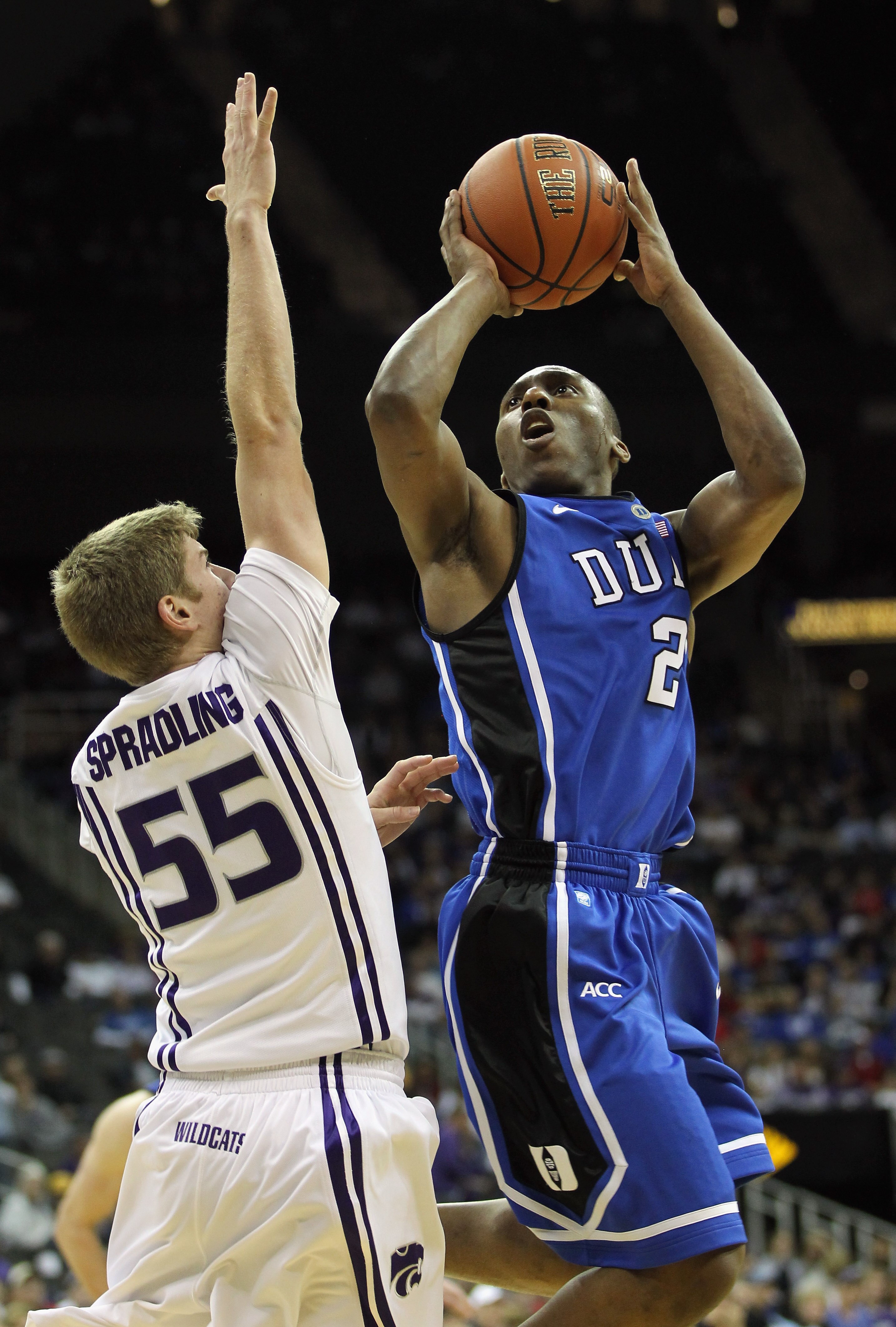 KANSAS CITY, MO - NOVEMBER 23:  Nolan Smith #2 of the Duke Blue Devils shoots over Will Spradling #55 of the Kansas State Wildcats during the CBE Classic championship game on November 23, 2010 at the Sprint Center in Kansas City, Missouri.  (Photo by Jami