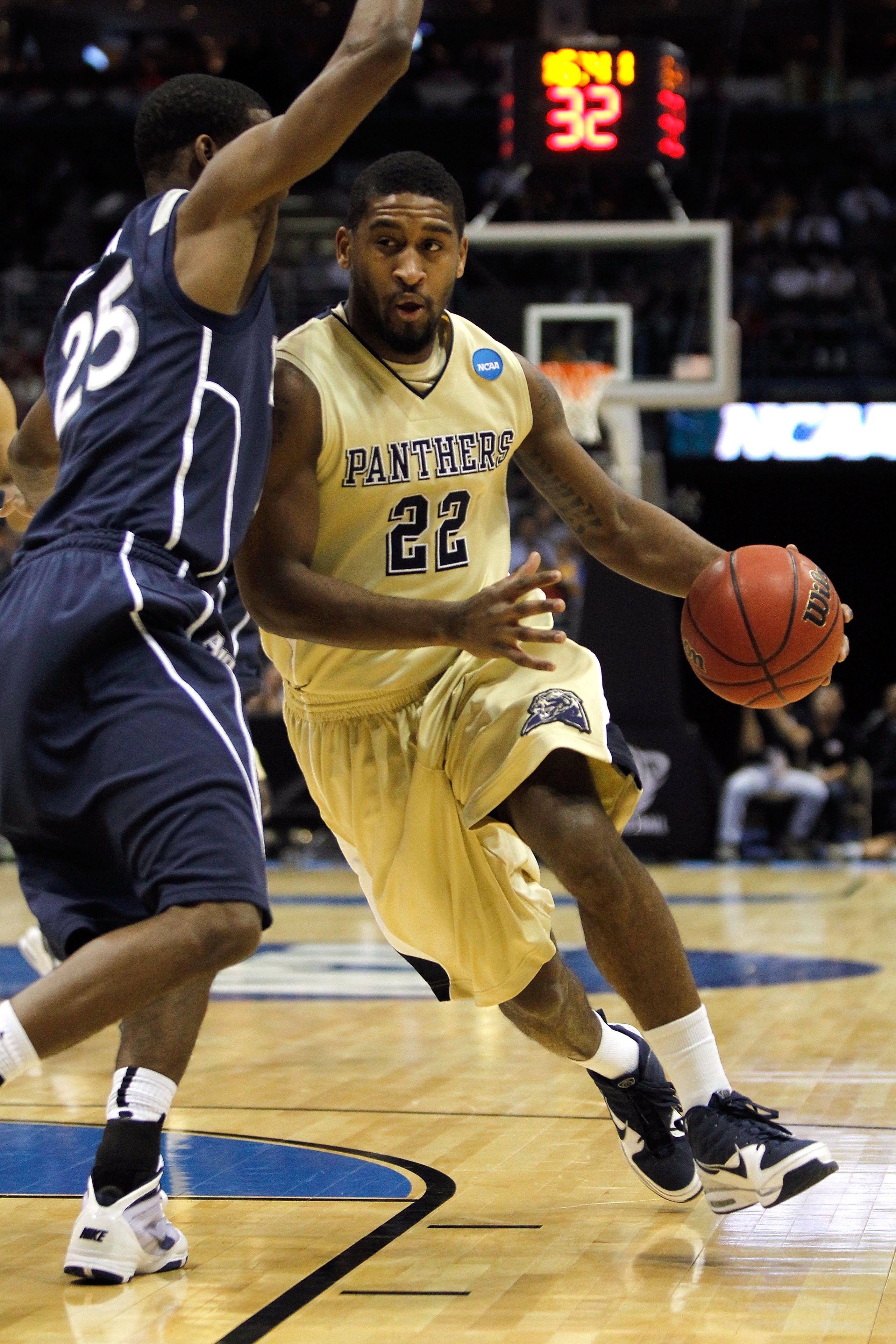 MILWAUKEE - MARCH 21:  Brad Wanamaker #22 of the Pittsburgh Panthers drives on Dante Jackson #25 of the Xavier Musketeers during the second round of the 2010 NCAA men's basketball tournament at the Bradley Center on March 21, 2010 in Milwaukee, Wisconsin.