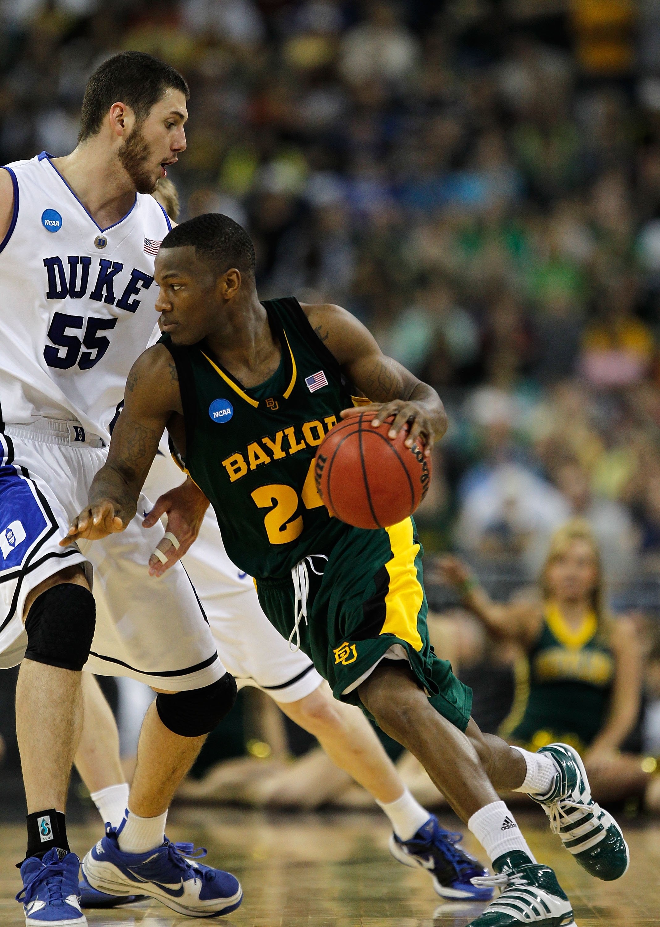 HOUSTON - MARCH 28: LaceDarius Dunn #24 of the Baylor Bears moves against Brian Zoubek #55 of the Duke Blue Devils during the south regional final of the 2010 NCAA men's basketball tournament at Reliant Stadium on March 28, 2010 in Houston, Texas. Duke de