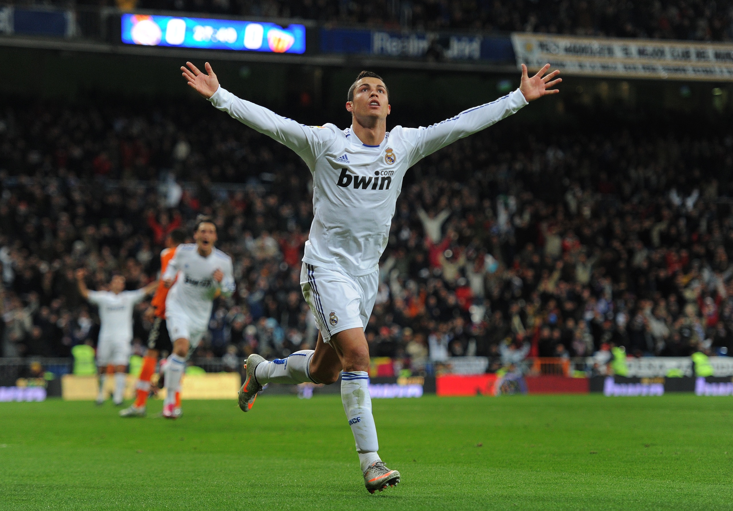 MADRID, SPAIN - DECEMBER 04:  Cristiano Ronaldo of Real Madrid celebrates scoring his sides opening goal during the La Liga match between Real Madrid and Valencia at Estadio Santiago Bernabeu on December 4, 2010 in Madrid, Spain.  (Photo by Jasper Juinen/