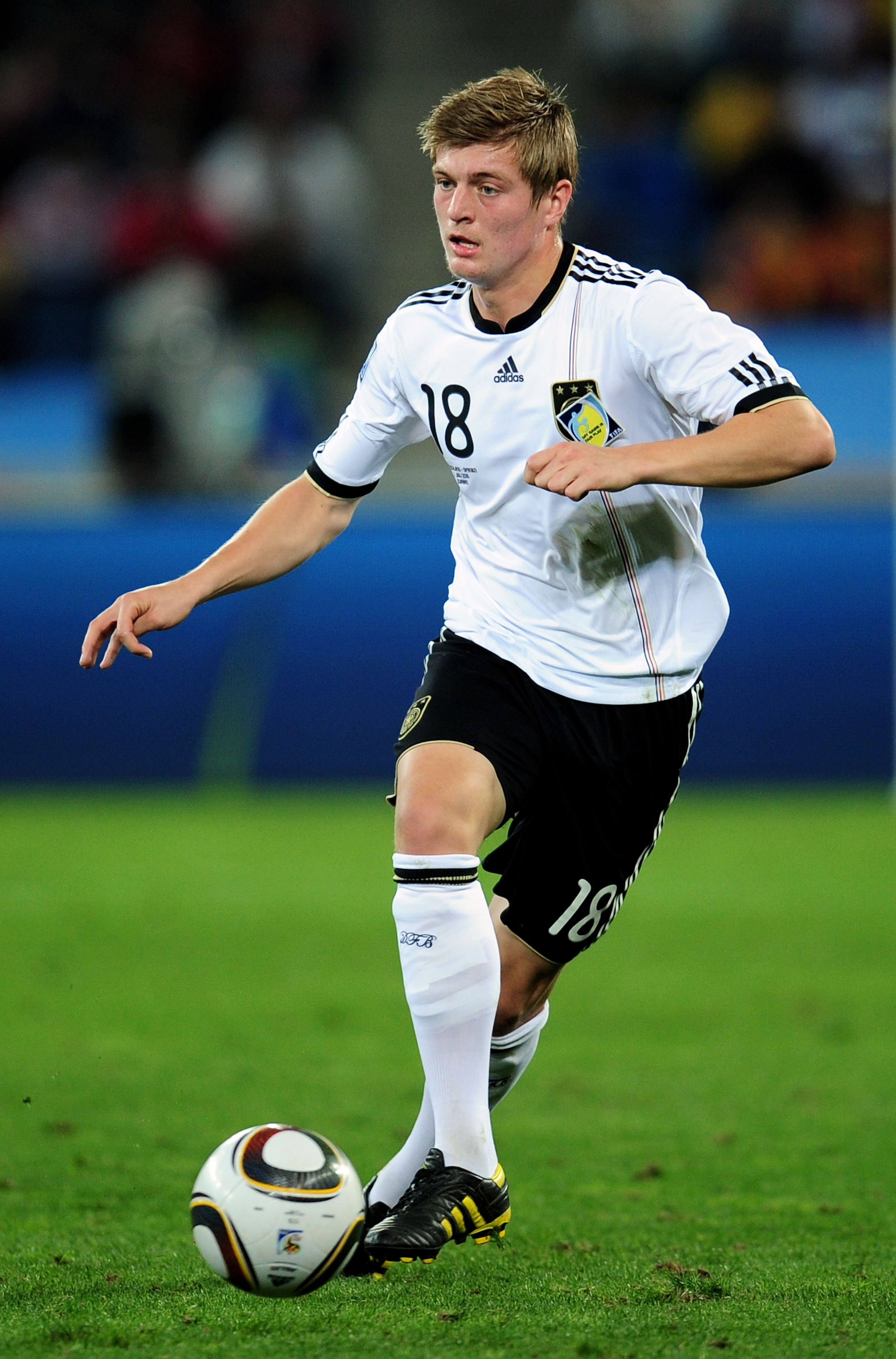 DURBAN, SOUTH AFRICA - JULY 07:  Toni Kroos of Germany runs with the ball during the 2010 FIFA World Cup South Africa Semi Final match between Germany and Spain at Durban Stadium on July 7, 2010 in Durban, South Africa.  (Photo by Clive Mason/Getty Images