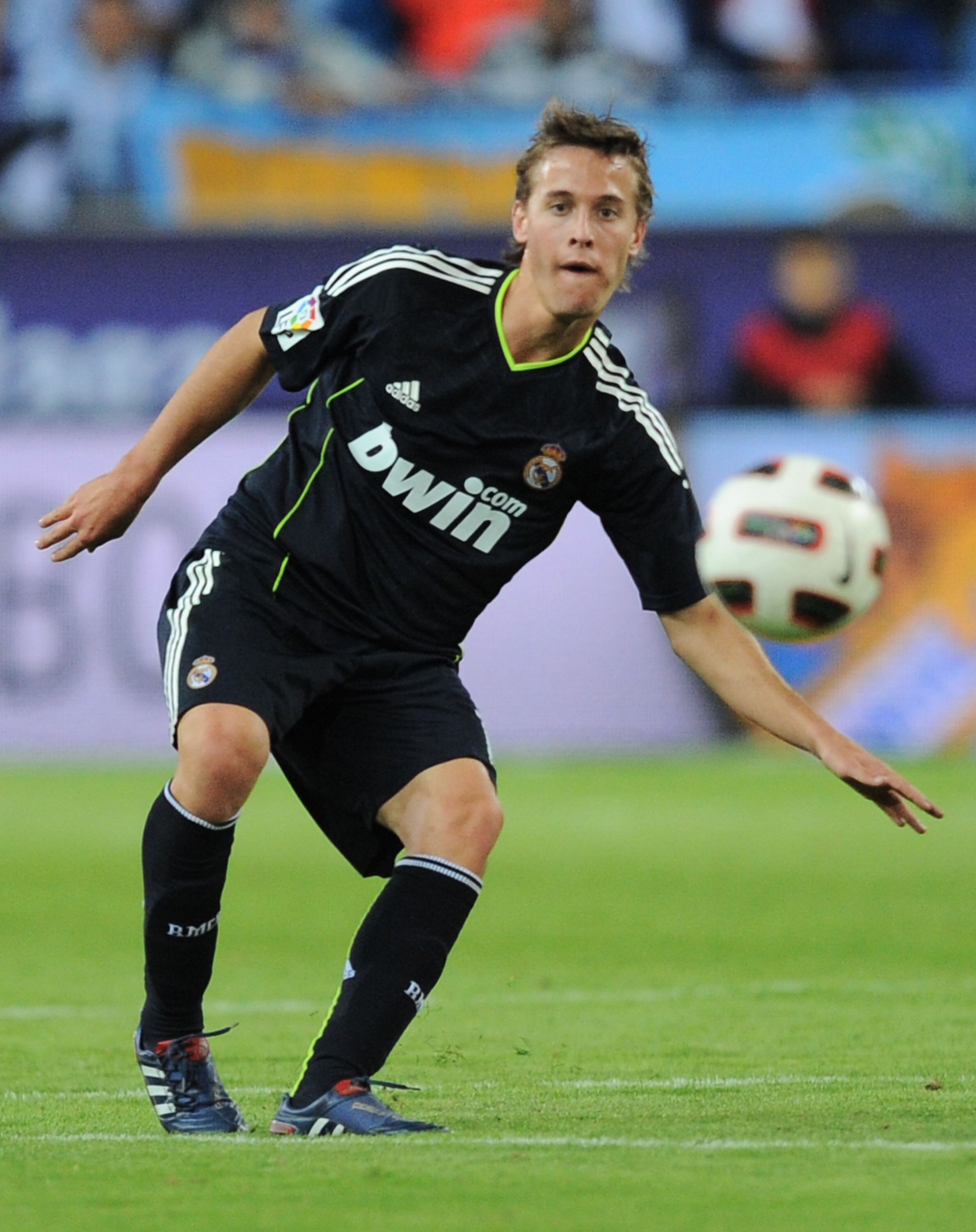 MALAGA, SPAIN - OCTOBER 16: Sergio Canales of Real Madrid passes the ball during the La Liga match between Malaga and Real Madrid at La Rosaleda Stadium on October 16, 2010 in Malaga, Spain.  (Photo by Denis Doyle/Getty Images)