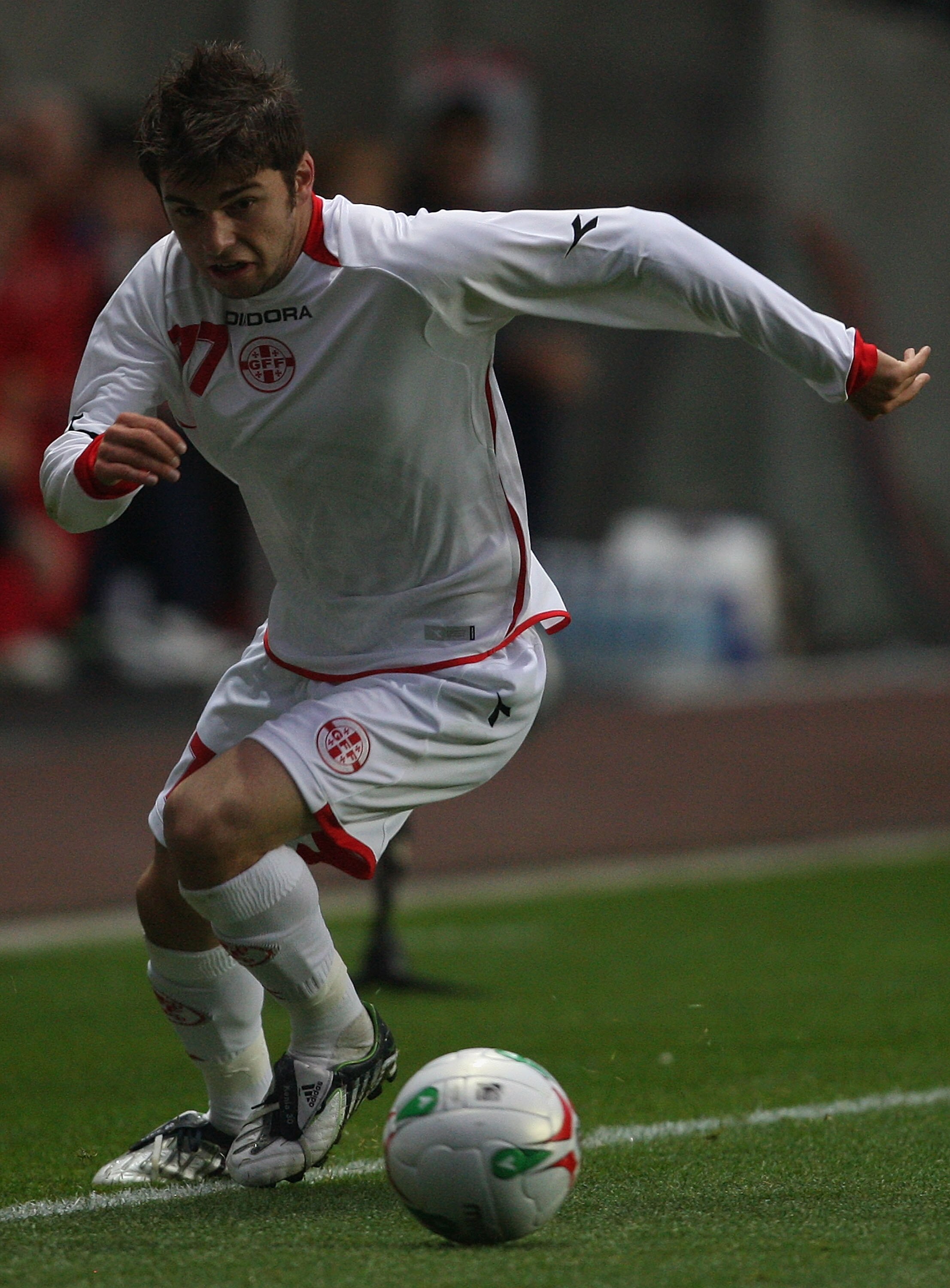 SWANSEA, UNITED KINGDOM - AUGUST 20:  Levan Kenia of Georgia in action during the International Friendly match between Wales and Georgia at The Liberty Stadium on August 20, 2008 in Swansea, Wales.  (Photo by Hamish Blair/Getty Images)