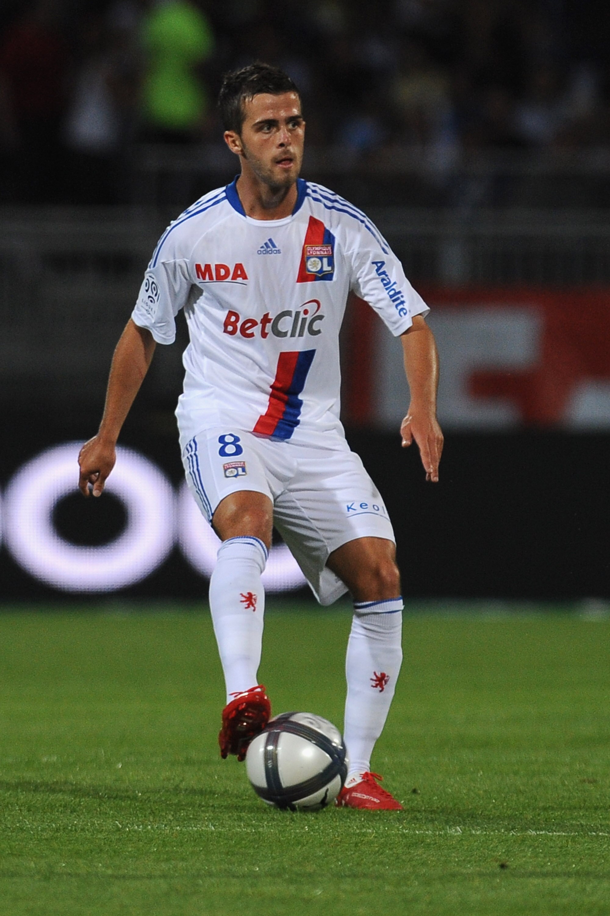 LYON, FRANCE - AUGUST 07:  Miralem Pjanic of Olympique Lyonnais in action during the Ligue 1 match between Olympique Lyonnais and AS Monaco FC at Gerland Stadium on August 7, 2010 in Lyon, France.  (Photo by Valerio Pennicino/Getty Images)