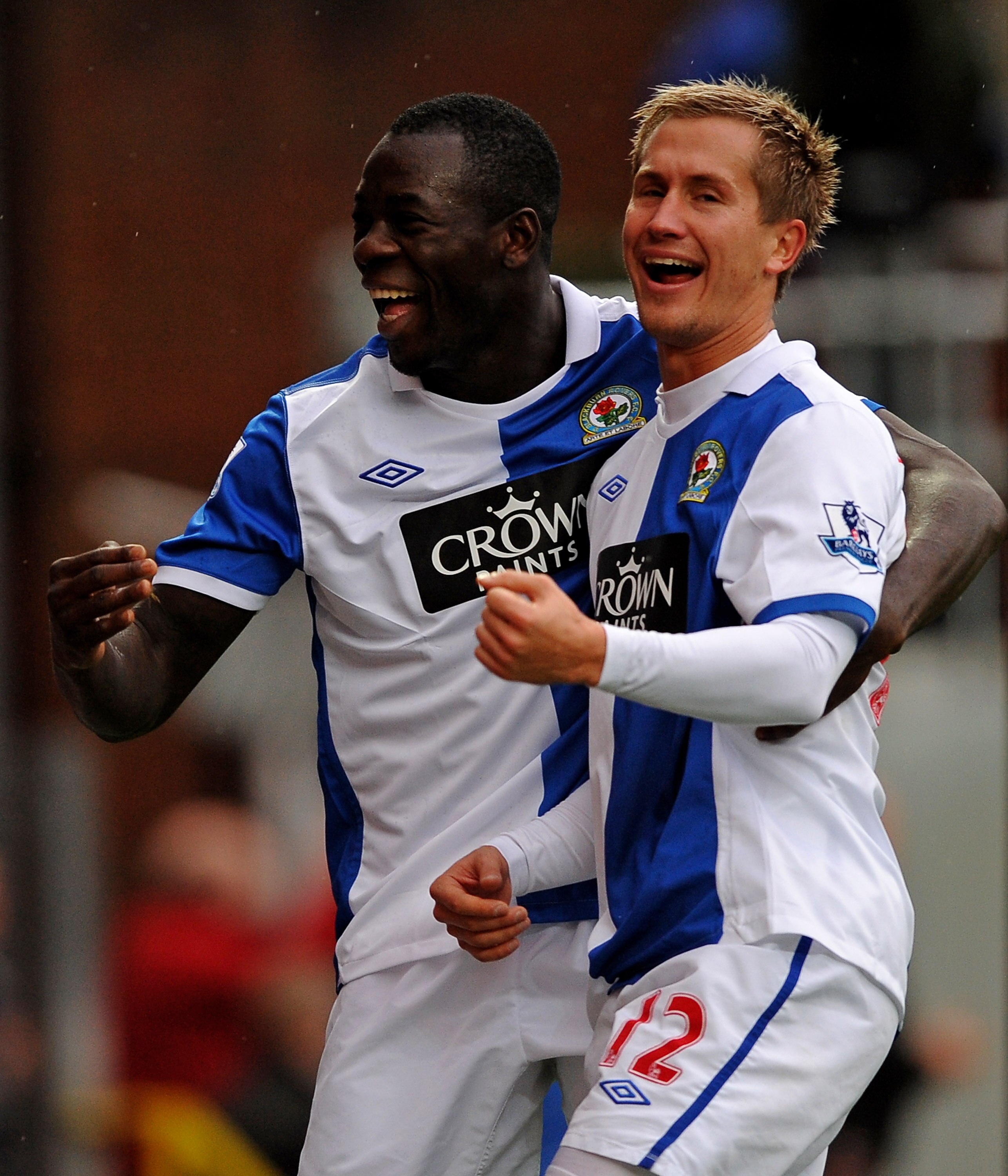 BLACKBURN, ENGLAND - NOVEMBER 21:  Morten Gamst Pedersen of Blackburn Rovers celebrates scoring his team's second goal with team mate Chris Samba (L) during the Barclays Premier League match between Blackburn Rovers and Aston Villa at Ewood Park on Novemb