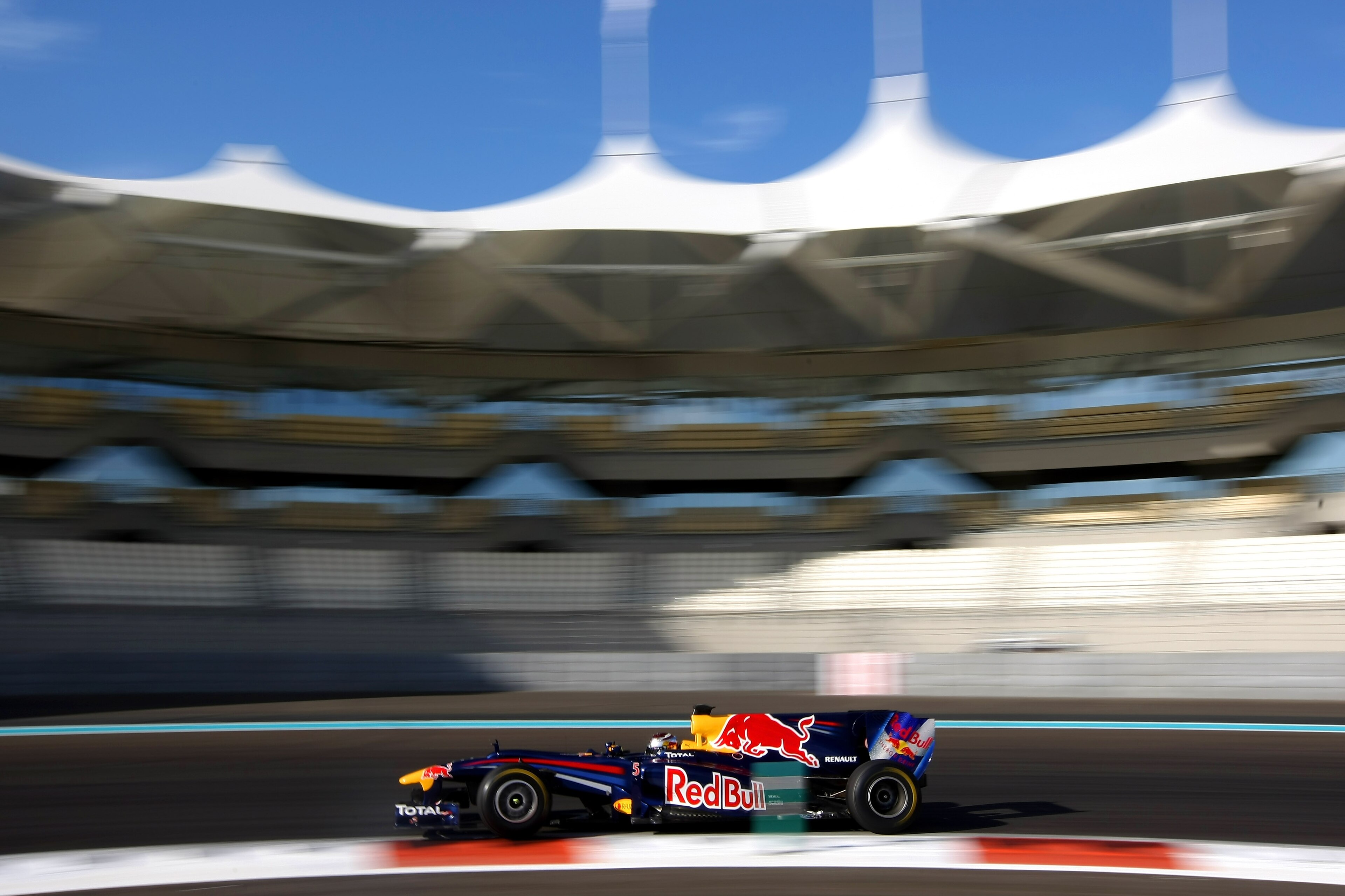 ABU DHABI, UNITED ARAB EMIRATES - NOVEMBER 19:  Sebastian Vettel of Germany and Red Bull Racing in action during the Formula 1 Pirelli Tyre Testing at the Yas Marina Circuit on November 19, 2010 in Abu Dhabi, United Arab Emirates.  (Photo by Andrew Hone/G