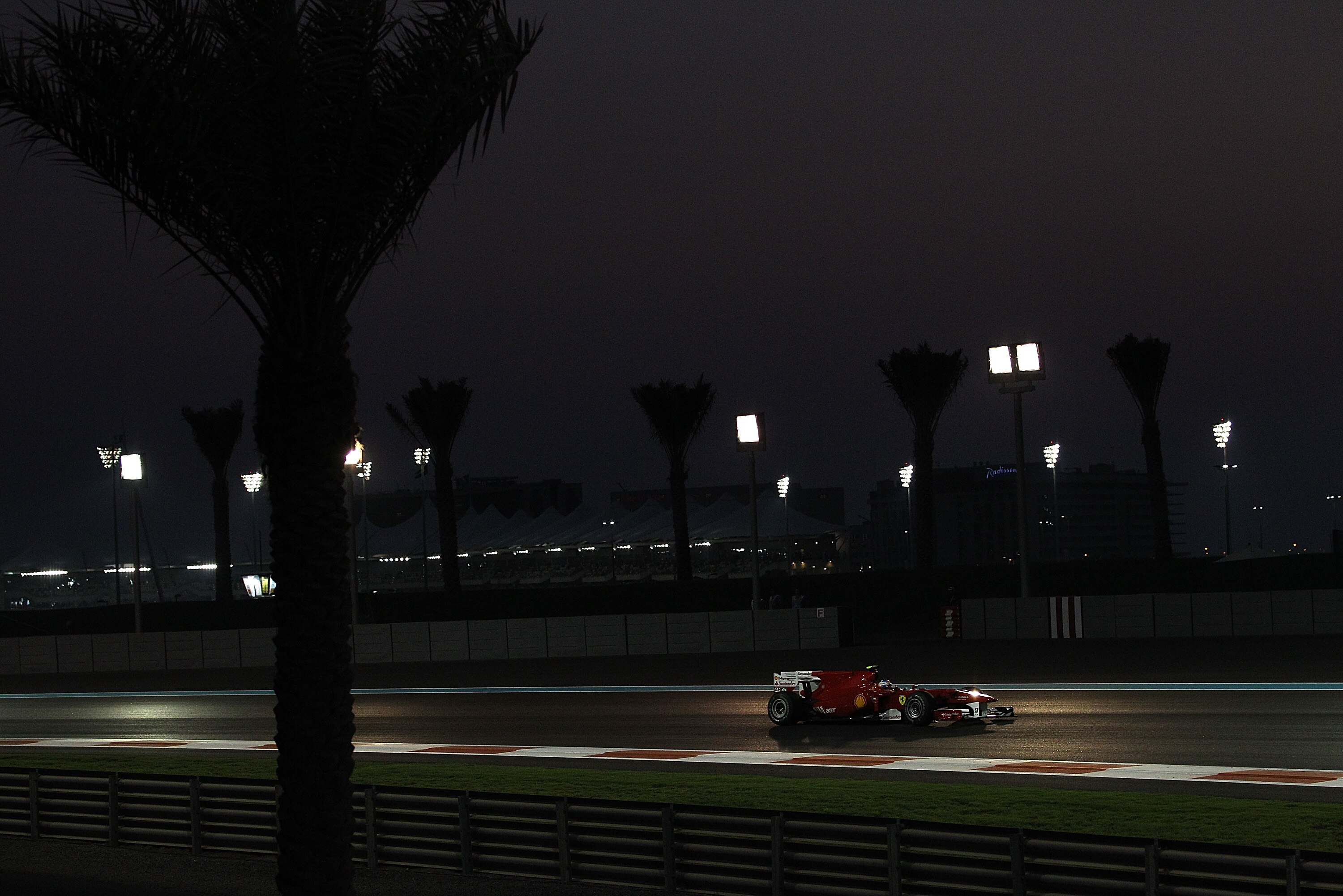 ABU DHABI, UNITED ARAB EMIRATES - NOVEMBER 14:  Fernando Alonso of Spain and Ferrari in action during the Abu Dhabi Formula One Grand Prix at the Yas Marina Circuit on November 14, 2010 in Abu Dhabi, United Arab Emirates.  (Photo by Vladimir Rys/Getty Ima