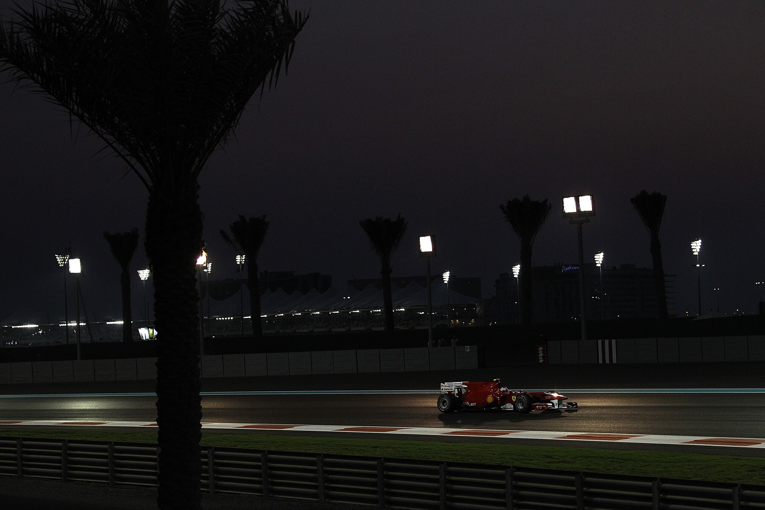 ABU DHABI, UNITED ARAB EMIRATES - NOVEMBER 14: Fernando Alonso of Spain and Ferrari in action during the Abu Dhabi Formula One Grand Prix at the Yas Marina Circuit on November 14, 2010 in Abu Dhabi, United Arab Emirates. (Photo by Vladimir Rys/Getty Ima ABU DHABI, UNITED ARAB EMIRATES - NOVEMBER 14: Fernando Alonso of Spain and Ferrari in action during the Abu Dhabi Formula One Grand Prix at the Yas Marina Circuit on November 14, 2010 in Abu Dhabi, United Arab Emirates. (Photo by Vladimir Rys/Getty Ima