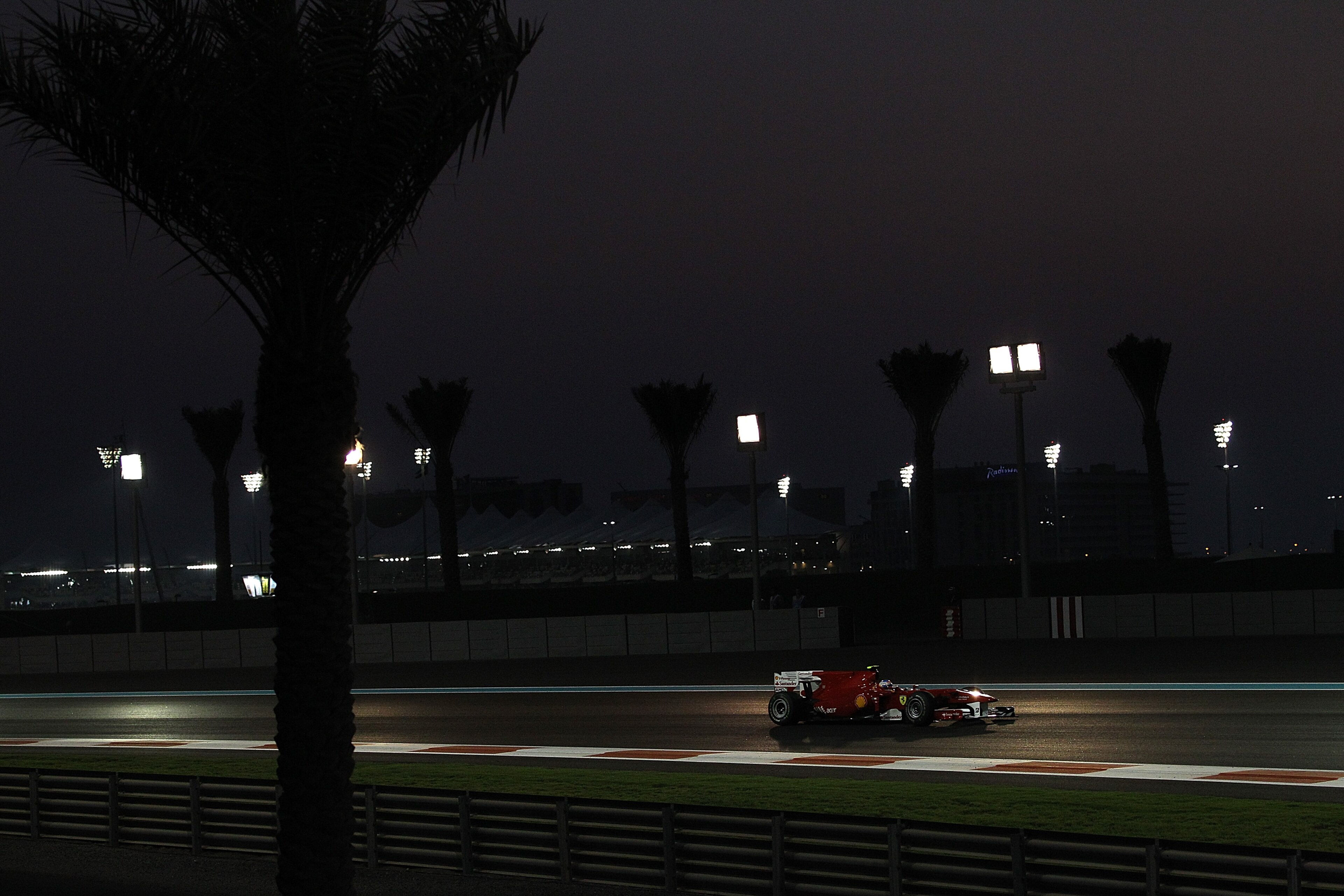 ABU DHABI, UNITED ARAB EMIRATES - NOVEMBER 14:  Fernando Alonso of Spain and Ferrari in action during the Abu Dhabi Formula One Grand Prix at the Yas Marina Circuit on November 14, 2010 in Abu Dhabi, United Arab Emirates.  (Photo by Vladimir Rys/Getty Ima