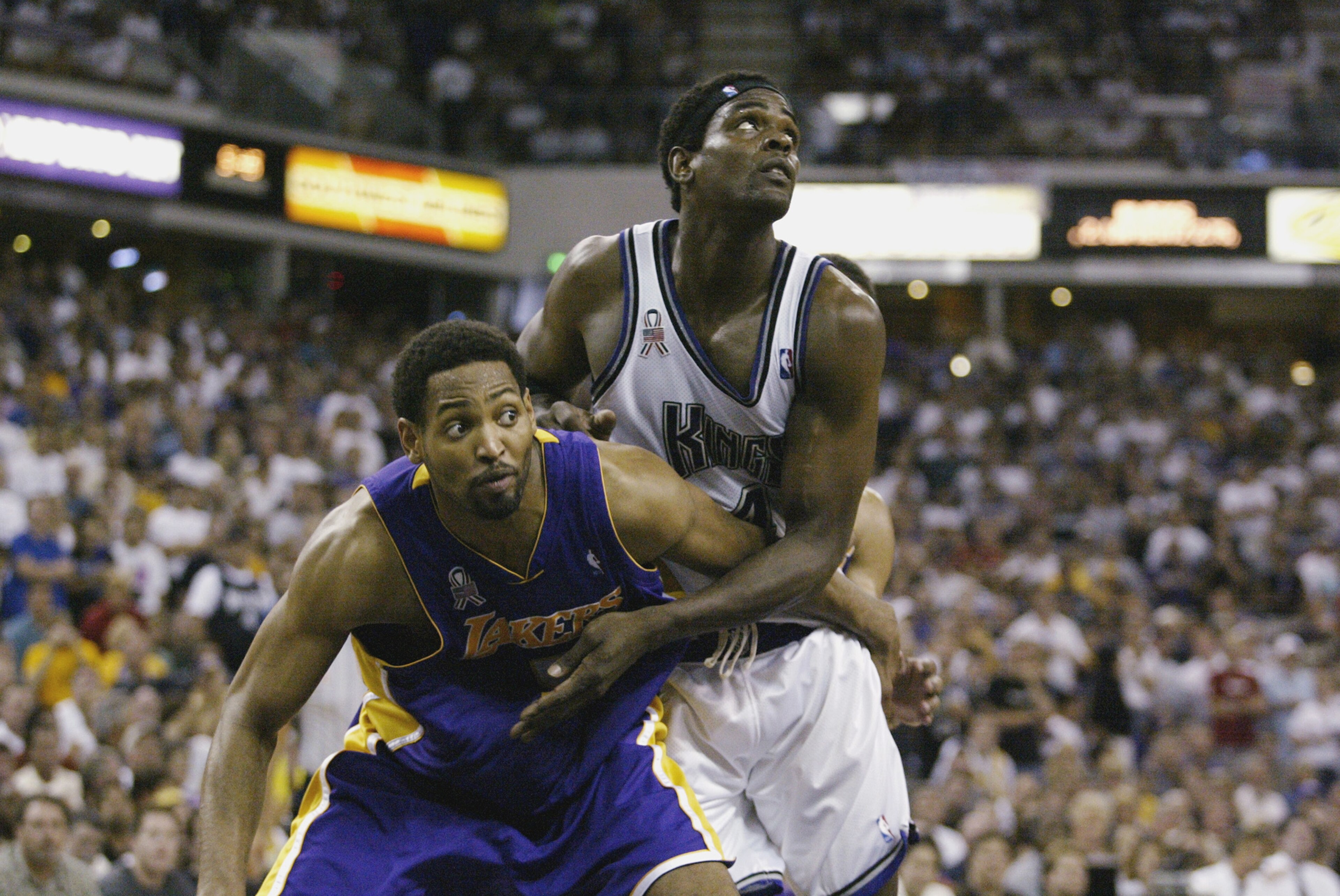 SACRAMENTO, CA - JUNE 2: Robert Horry #5 of the Los Angeles Lakers and Chris Webber #4 of the Sacramento Kings battle for position in Game seven of the Western Conference Finals during the 2002 NBA Playoffs at Arco Arena in Sacramento, California on June