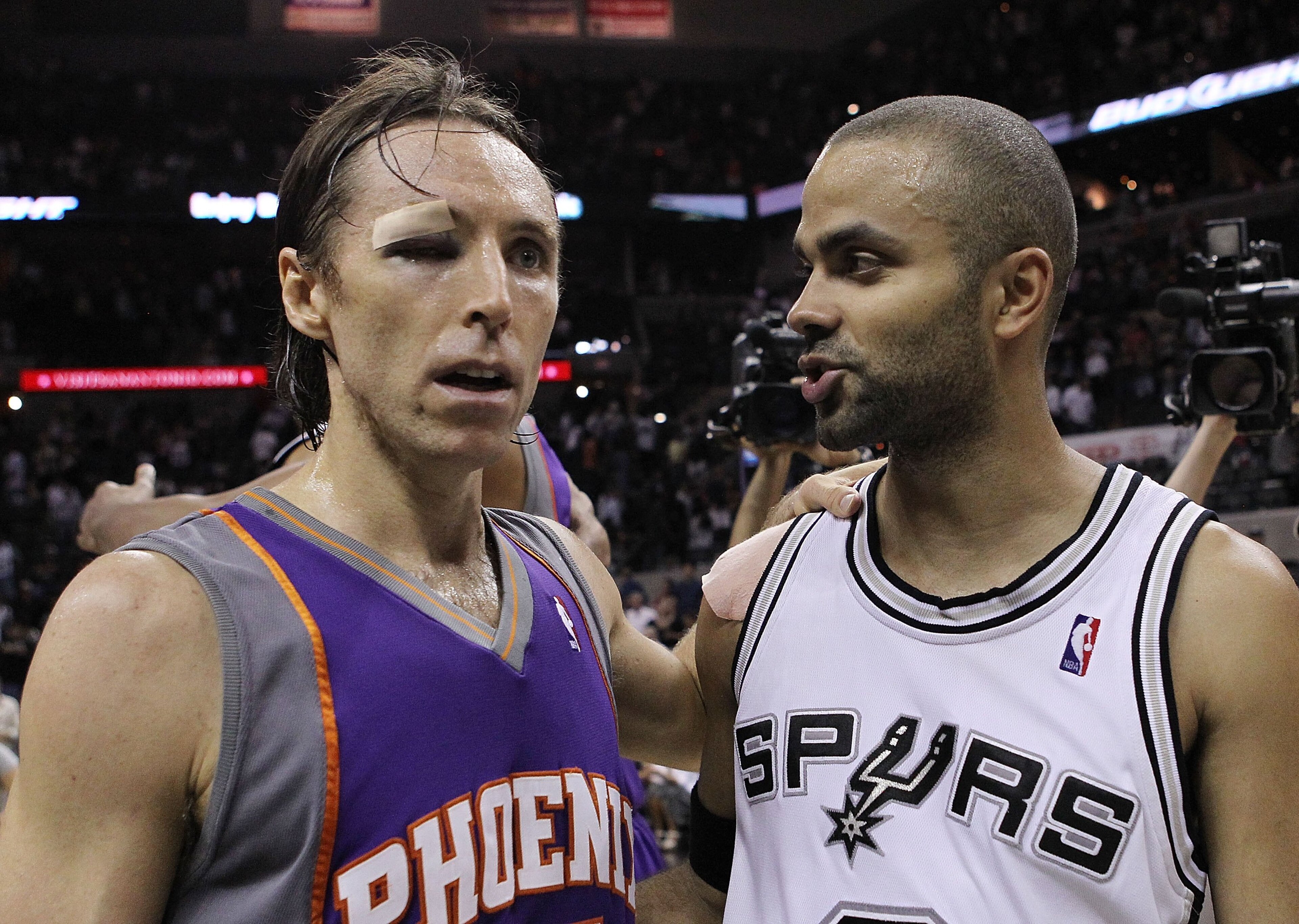 SAN ANTONIO - MAY 09:  Guard Steve Nash #13 of the Phoenix Suns talks with Tony Parker #9 of the San Antonio Spurs in Game Four of the Western Conference Semifinals during the 2010 NBA Playoffs at AT&T Center on May 9, 2010 in San Antonio, Texas.  The Sun