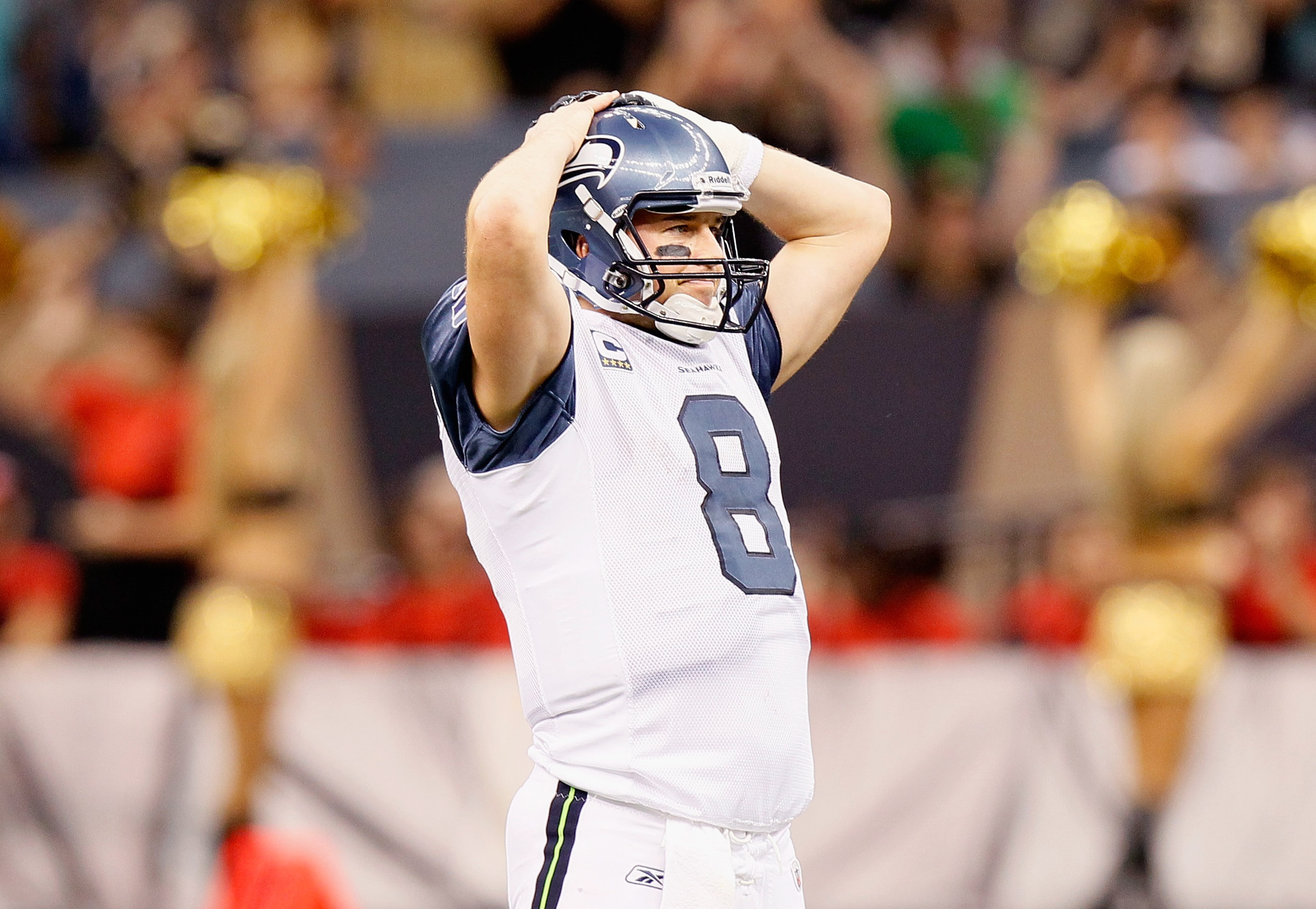 NEW ORLEANS - NOVEMBER 21:  Quarterback Matt Hasselbeck #8 of the Seattle Seahawks reacts after a turnover to the New Orleans Saints that was overturned into an incomplete pass on a coach's challenge at Louisiana Superdome on November 21, 2010 in New Orle