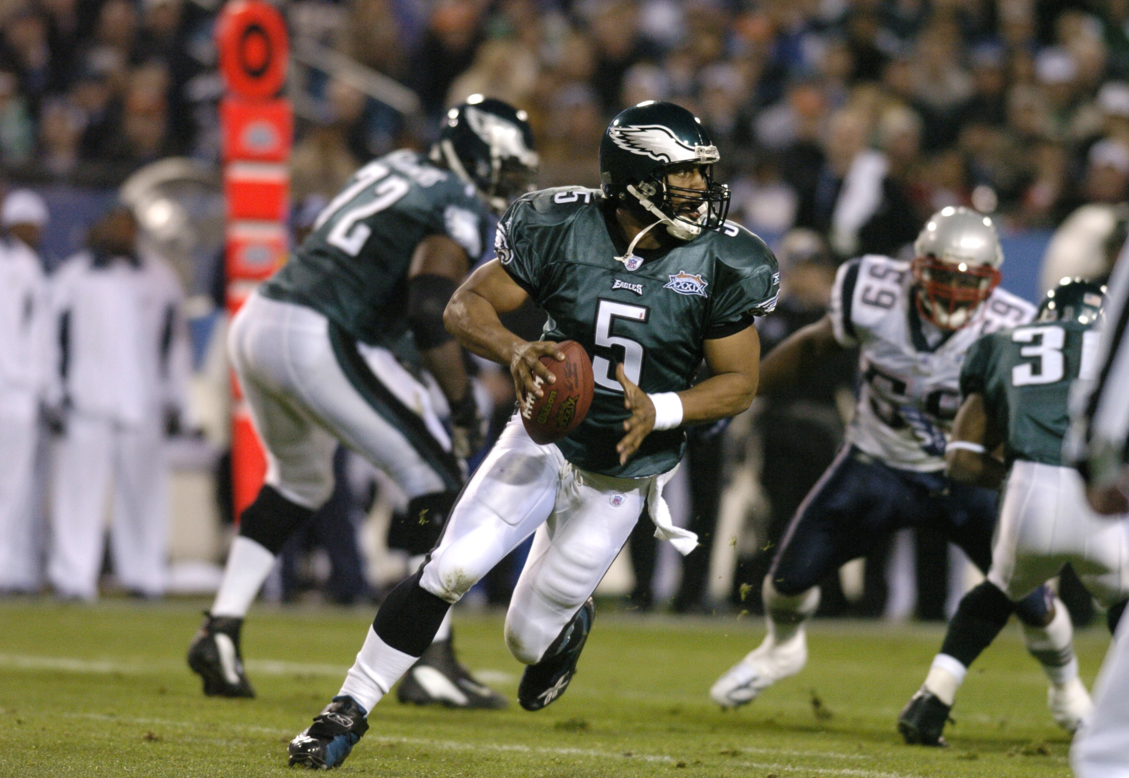 Philadelphia Eagle's QB Donovan McNabb with the ball during the first quarter of Super Bowl XXXIX between the Eagles and the New England Patriots at Alltel Stadium in Jacksonville, Florida on February 6, 2005.  (Photo by Al Messerschmidt/Getty Images)