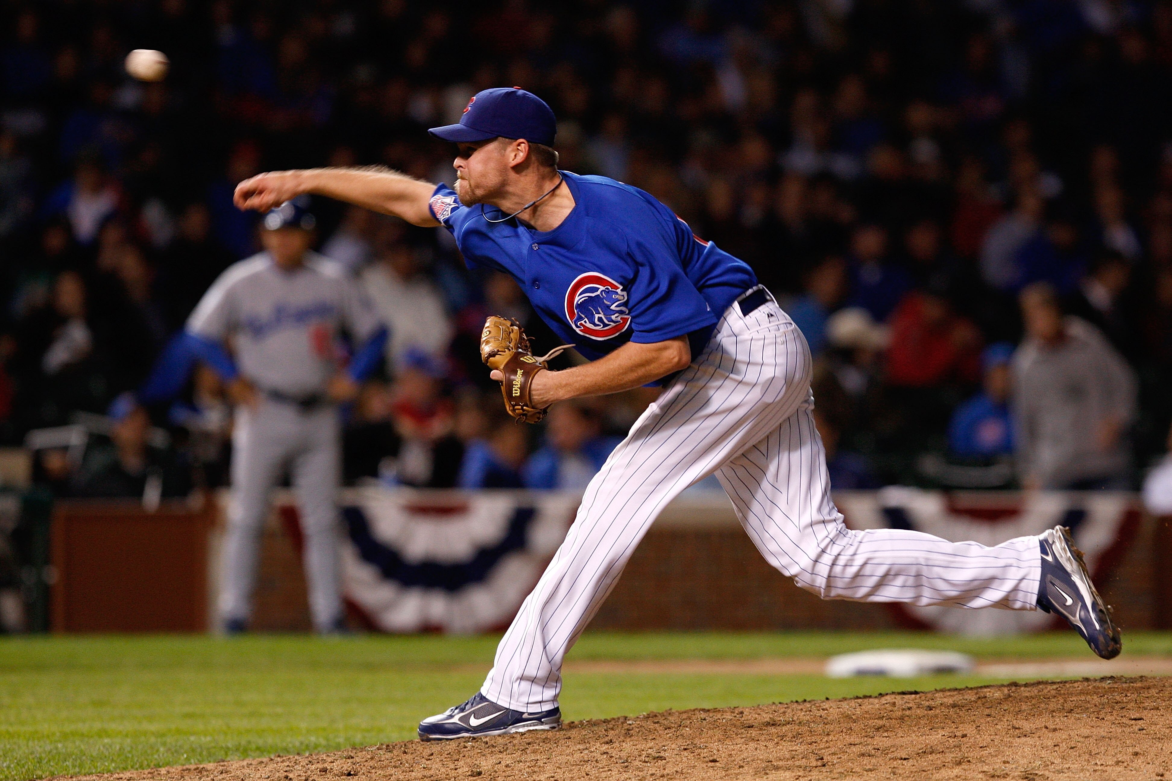 CHICAGO - OCTOBER 02:  Kerry Wood #34 of the Chicago Cubs throws a pitch against the Los Angeles Dodgers in Game Two of the NLDS during the 2008 MLB Playoffs at Wrigley Field on October 2, 2008 in Chicago, Illinois. The Dodgers won 10-3. (Photo by Jamie S