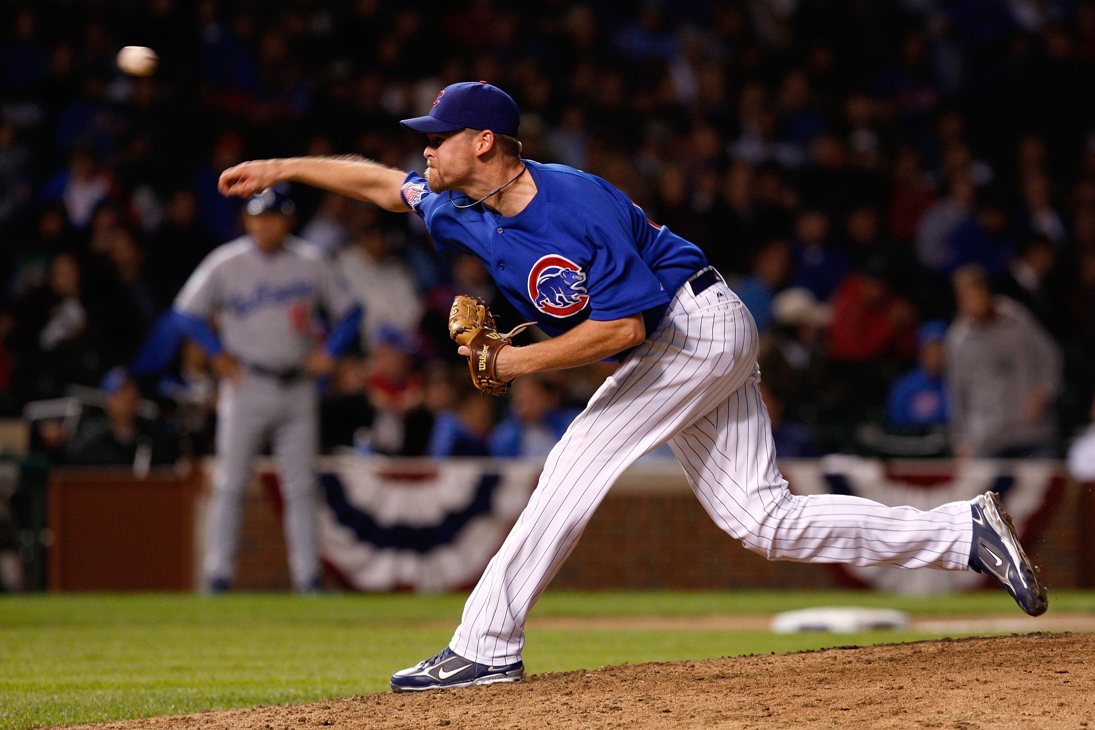 CHICAGO - OCTOBER 02:  Kerry Wood #34 of the Chicago Cubs throws a pitch against the Los Angeles Dodgers in Game Two of the NLDS during the 2008 MLB Playoffs at Wrigley Field on October 2, 2008 in Chicago, Illinois. The Dodgers won 10-3. (Photo by Jamie S