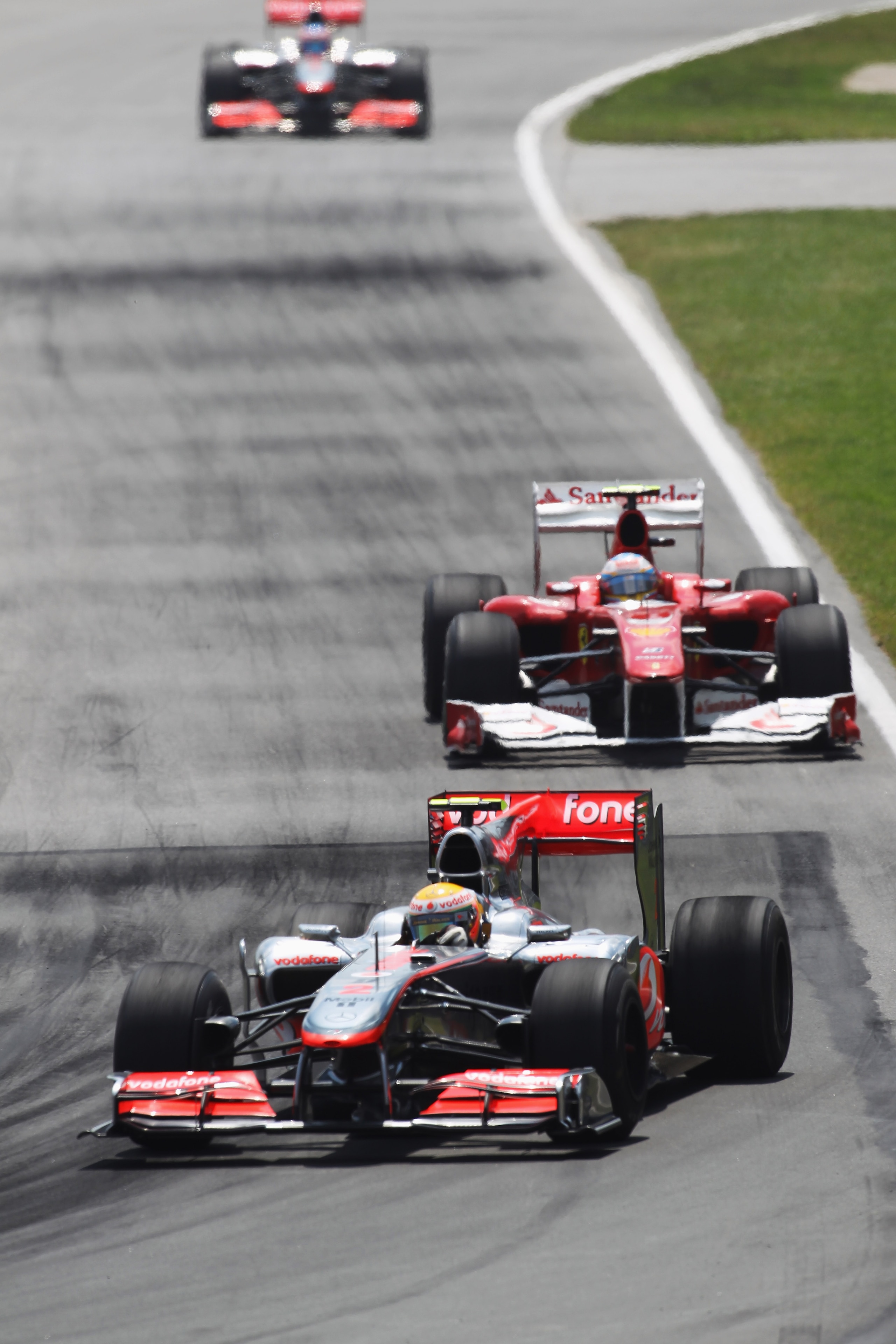 MONTREAL - JUNE 13: Lewis Hamilton of Great Britain and McLaren Mercedes leads from Fernando Alonso of Spain and Ferrari during the Canadian Formula One Grand Prix at the Circuit Gilles Villeneuve on June 13, 2010 in Montreal, Canada. (Photo by Bryn Len MONTREAL - JUNE 13: Lewis Hamilton of Great Britain and McLaren Mercedes leads from Fernando Alonso of Spain and Ferrari during the Canadian Formula One Grand Prix at the Circuit Gilles Villeneuve on June 13, 2010 in Montreal, Canada. (Photo by Bryn Len