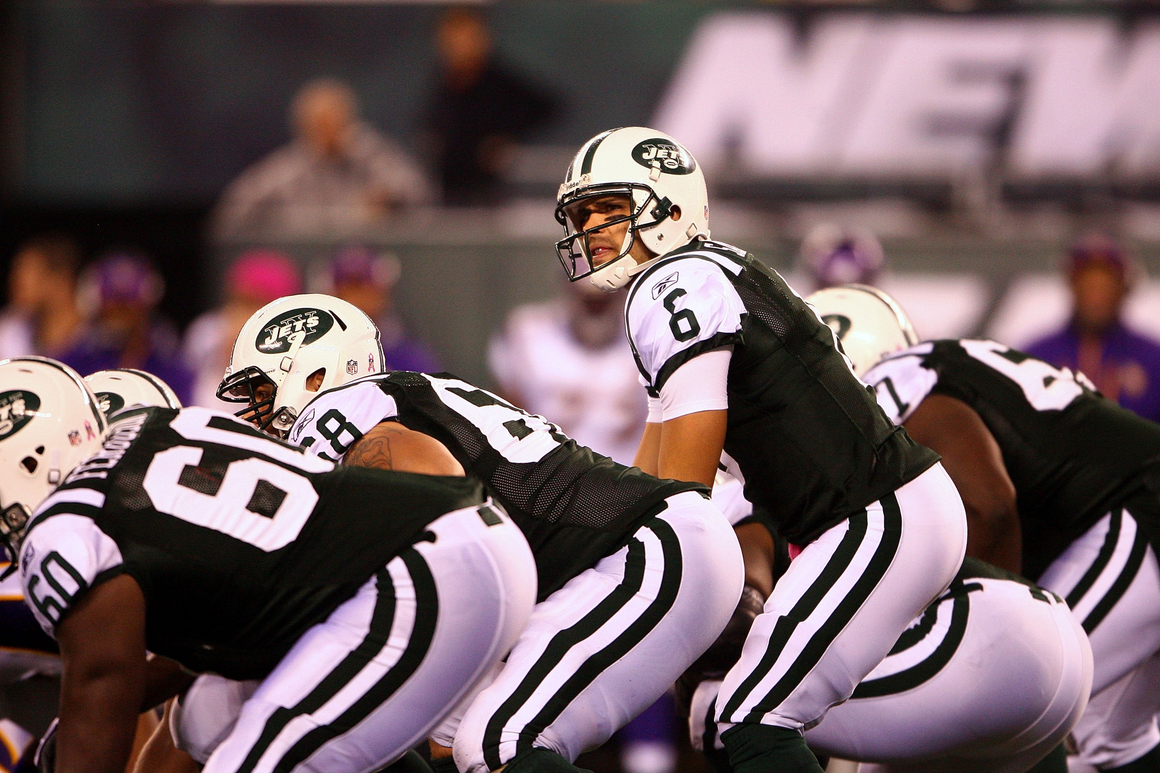 EAST RUTHERFORD, NJ - OCTOBER 11: Quarterback Mark Sanchez #6 of the New York Jets stands behind the line of scrimmage against the Minnesota Vikings at New Meadowlands Stadium on October 11, 2010 in East Rutherford, New Jersey. (Photo by Andrew Burton/G EAST RUTHERFORD, NJ - OCTOBER 11: Quarterback Mark Sanchez #6 of the New York Jets stands behind the line of scrimmage against the Minnesota Vikings at New Meadowlands Stadium on October 11, 2010 in East Rutherford, New Jersey. (Photo by Andrew Burton/G