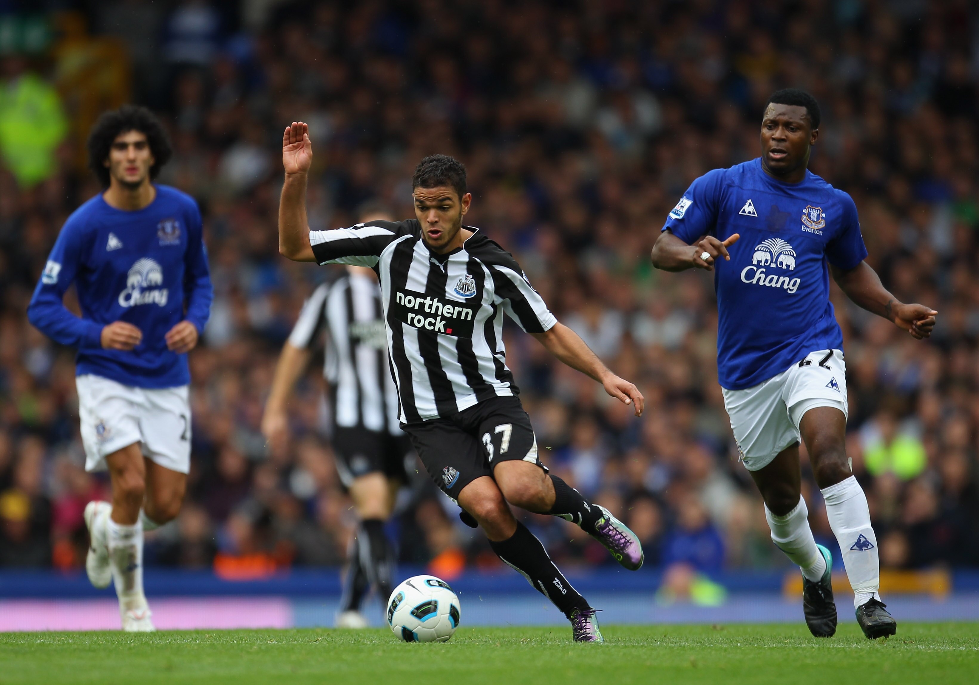LIVERPOOL, ENGLAND - SEPTEMBER 18:  Hatem Ben Arfa of Newcastle United beats Yakubu of Everton during the Barclays Premier League match between Everton and Newcastle United at Goodison Park on September 18, 2010 in Liverpool, England.  (Photo by Alex Live