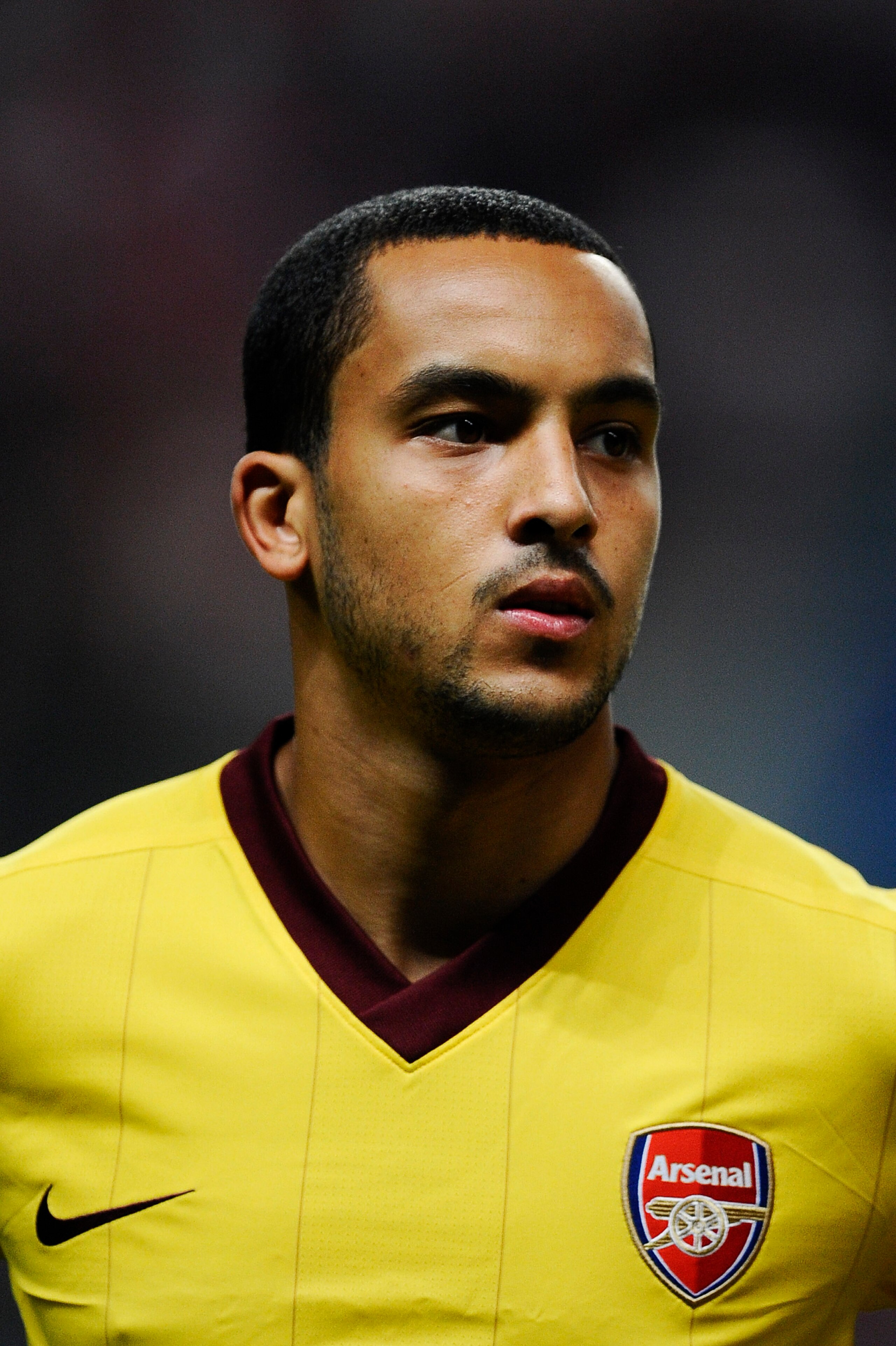 BRAGA, PORTUGAL - NOVEMBER 23:  Theo Walcott of Arsenal looks on during the UEFA Champions League Group H match between SC Braga and Arsenal at Estadio Municipal de Braga on November 23, 2010 in Braga, Portugal. SC Braga won the match 2-0.  (Photo by Davi