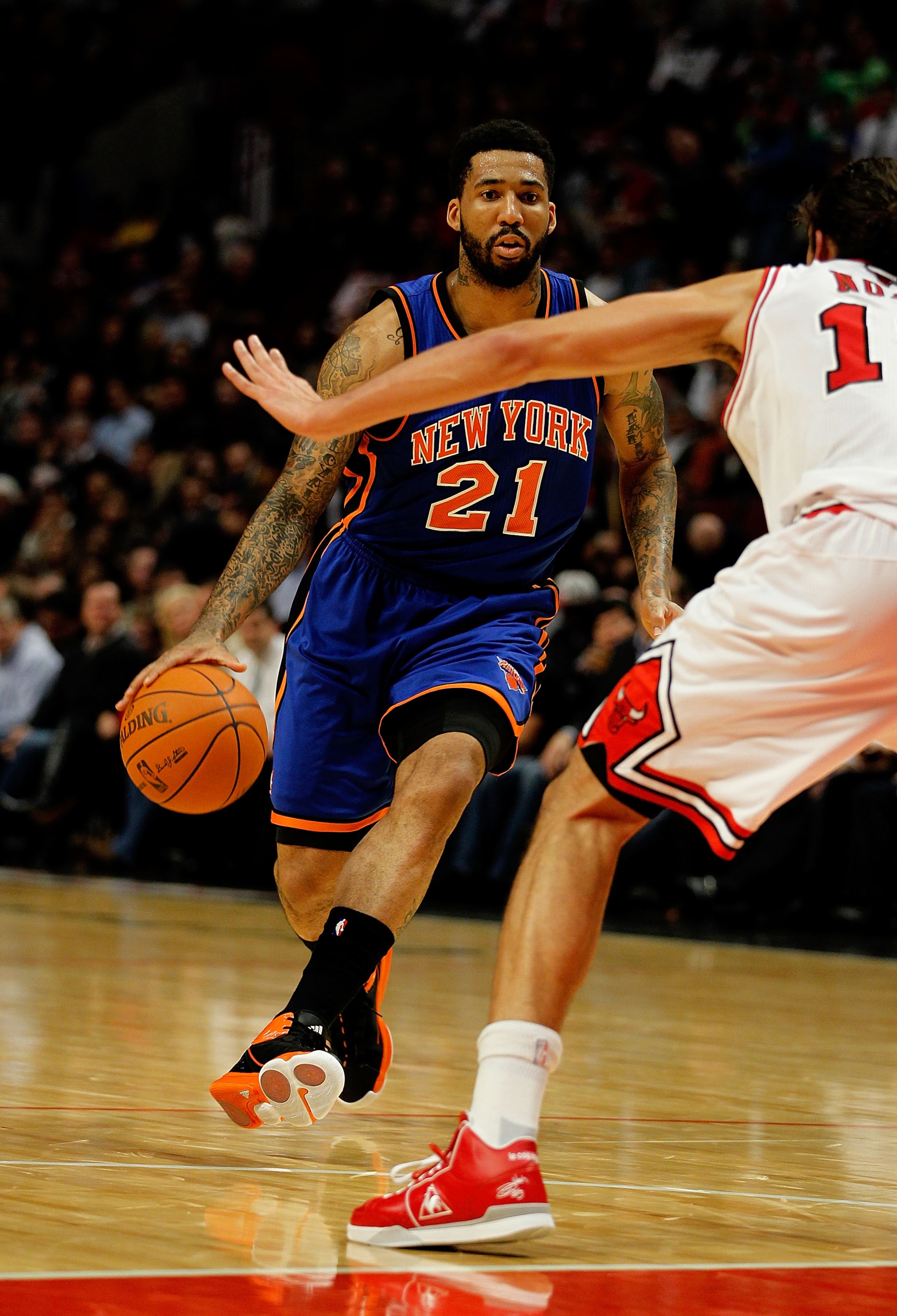 CHICAGO - NOVEMBER 04: Wilson Chandler #21 of the New York Knicks moves toward Joakim Noah #13 of the Chicago Bulls at the United Center on November 4, 2010 in Chicago, Illinois. The Knicks defeated the Bulls 120-112. NOTE TO USER: User expressly acknowle