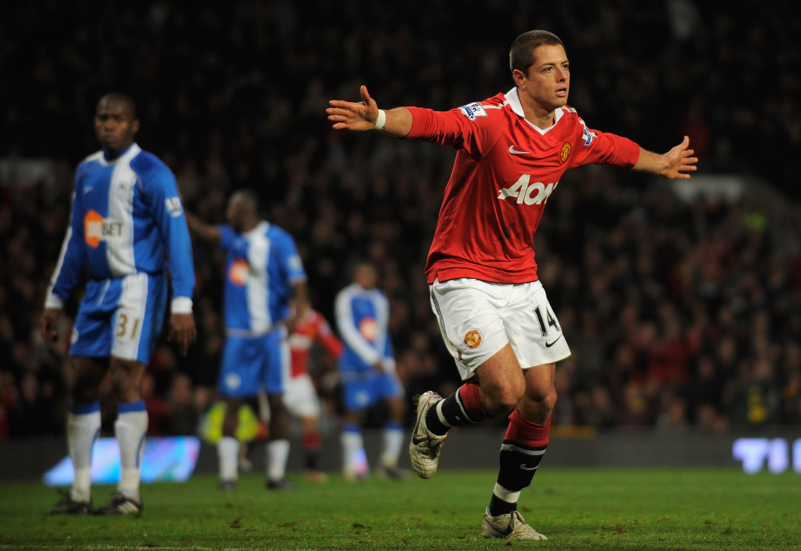 MANCHESTER, ENGLAND - NOVEMBER 20:  Javier Hernandez of Manchester United celebrates scoring his team's 2-0 goal during the Barclays Premier League match between Manchester United and Wigan Athletic at Old Trafford on November 20, 2010 in Manchester, Engl