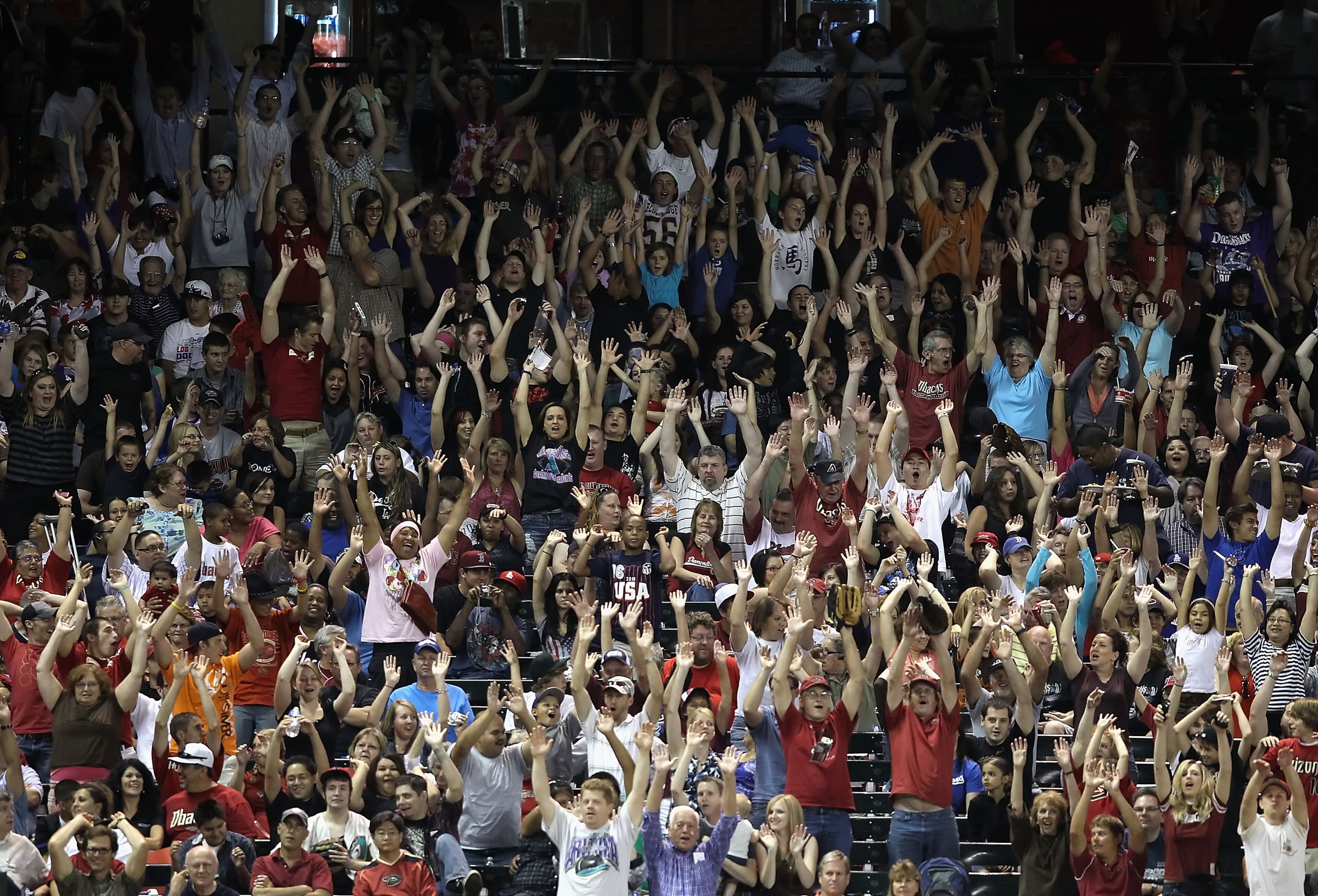PHOENIX - SEPTEMBER 24: Fans do the wave during the Major League Baseball game between the Los Angeles Dodgers and the Arizona Diamondbacks at Chase Field on September 24, 2010 in Phoenix, Arizona. (Photo by Christian Petersen/Getty Images) PHOENIX - SEPTEMBER 24: Fans do the wave during the Major League Baseball game between the Los Angeles Dodgers and the Arizona Diamondbacks at Chase Field on September 24, 2010 in Phoenix, Arizona. (Photo by Christian Petersen/Getty Images)