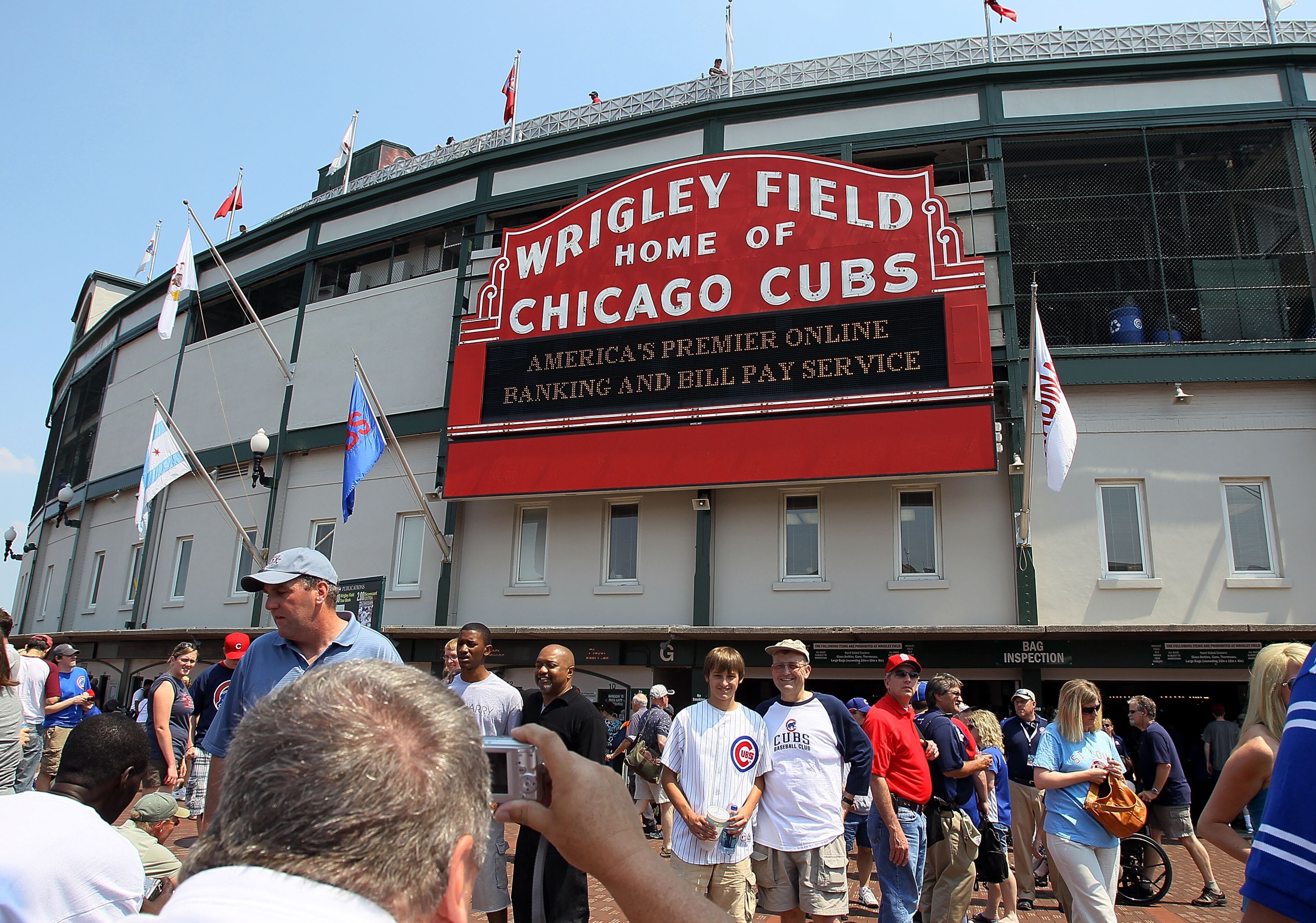 CHICAGO - MAY 30: Fans arrive for the game between the St. Louis Cardinals and the Chicago Cubs on May 30, 2010 at Wrigley Field in Chicago, Illinois. (Photo by Jim McIsaac/Getty Images) CHICAGO - MAY 30: Fans arrive for the game between the St. Louis Cardinals and the Chicago Cubs on May 30, 2010 at Wrigley Field in Chicago, Illinois. (Photo by Jim McIsaac/Getty Images)