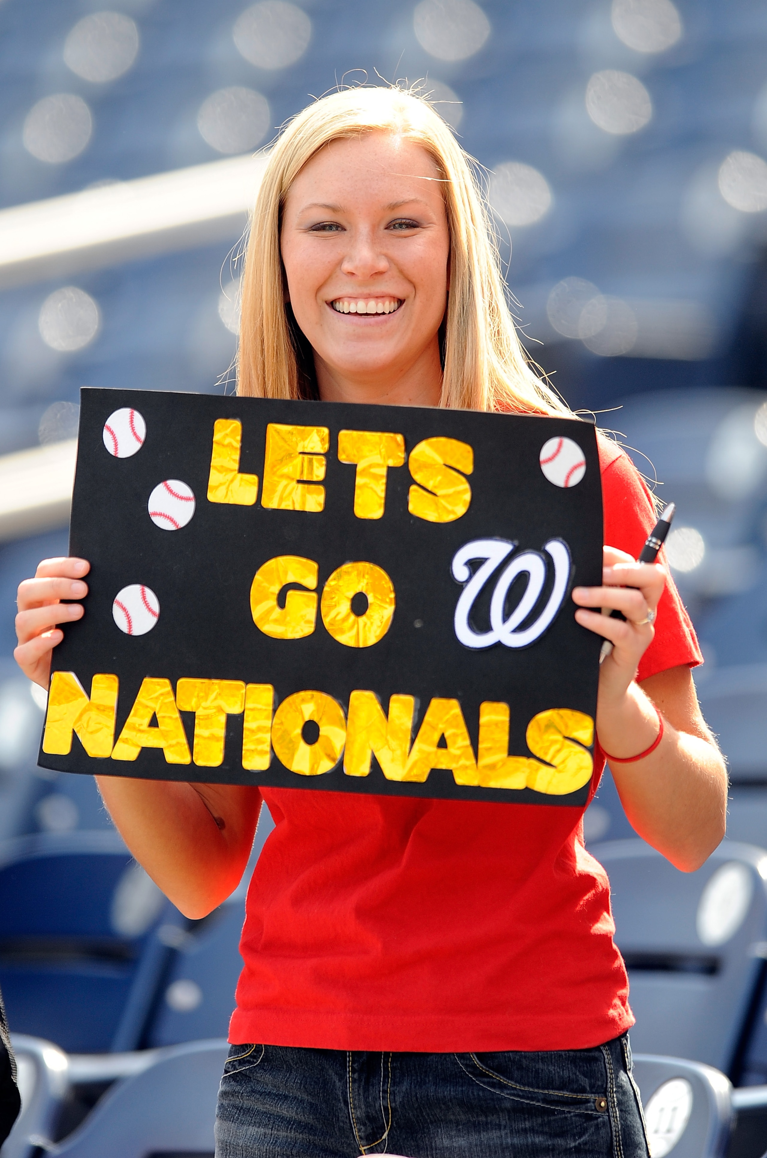 WASHINGTON - APRIL 05:  A fan holds up a sign before the game between the Philadelphia Phillies and the Washington Nationals on Opening Day at Nationals Park on April 5, 2010 in Washington, DC.  (Photo by Greg Fiume/Getty Images)