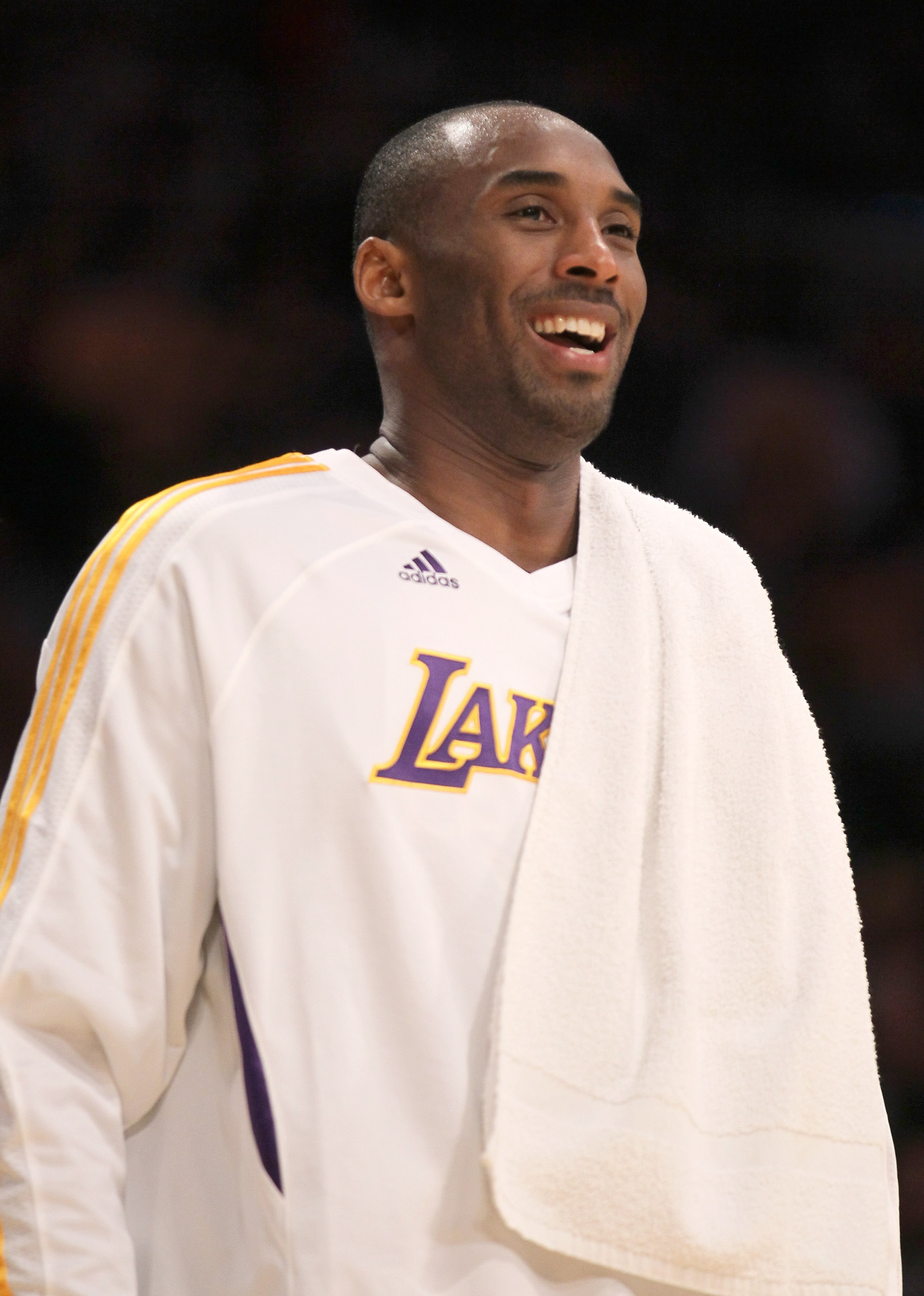 LOS ANGELES - NOVEMBER 21: Kobe Bryant #24 of the Los Angeles Lakers laughs as he looks on from the bench against the Golden State Warriors at Staples Center on November 21, 2010 in Los Angeles, California. NOTE TO USER: User expressly acknowledges and LOS ANGELES - NOVEMBER 21: Kobe Bryant #24 of the Los Angeles Lakers laughs as he looks on from the bench against the Golden State Warriors at Staples Center on November 21, 2010 in Los Angeles, California. NOTE TO USER: User expressly acknowledges and