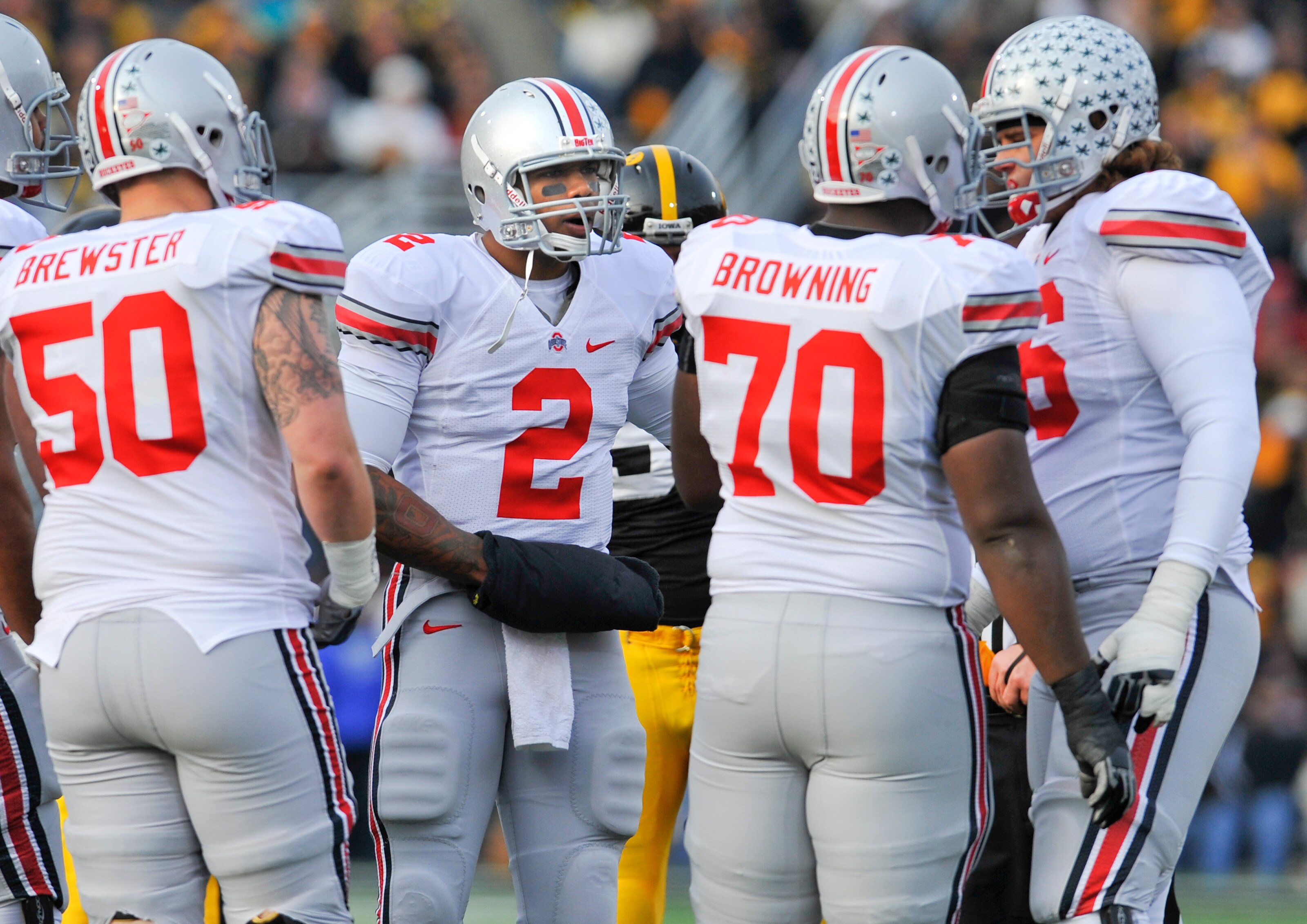 IOWA CITY, IA - NOVEMBER 20:  Quarterback Terrelle Pryor #2 of the Ohio State Buckeyes talks with teammates in the huddle during the play against the University of Iowa Hawkeyes at Kinnick Stadium on November 20, 2010 in Iowa City, Iowa. Ohio State won 20