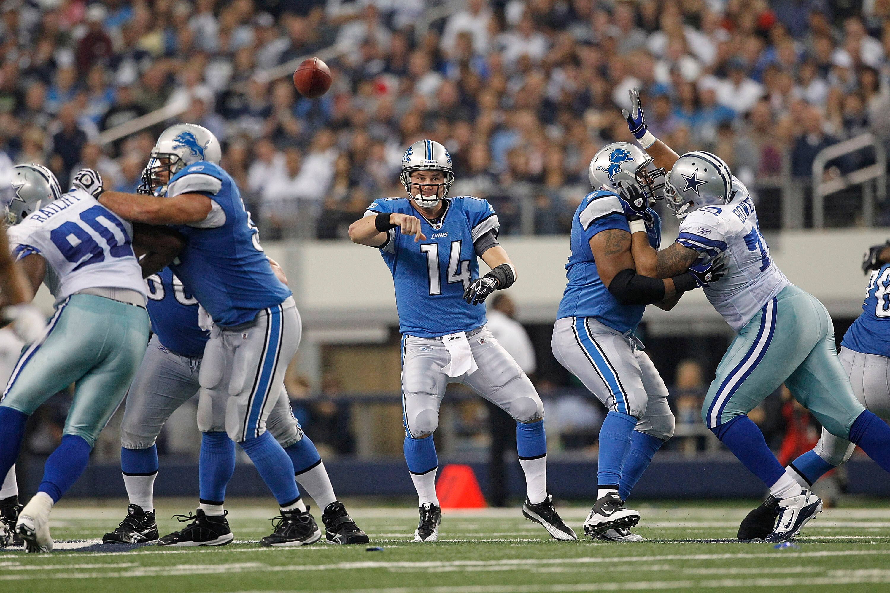 ARLINGTON, TX - NOVEMBER 21: Shaun Hill #14 of the Detroit Lions passes the ball during the game against the Dallas Cowboys at Dallas Stadium on November 21, 2010 in Arlington, Texas. The Cowboys defeated the Lions 35-19.  (Photo by Leon Halip/Getty Image