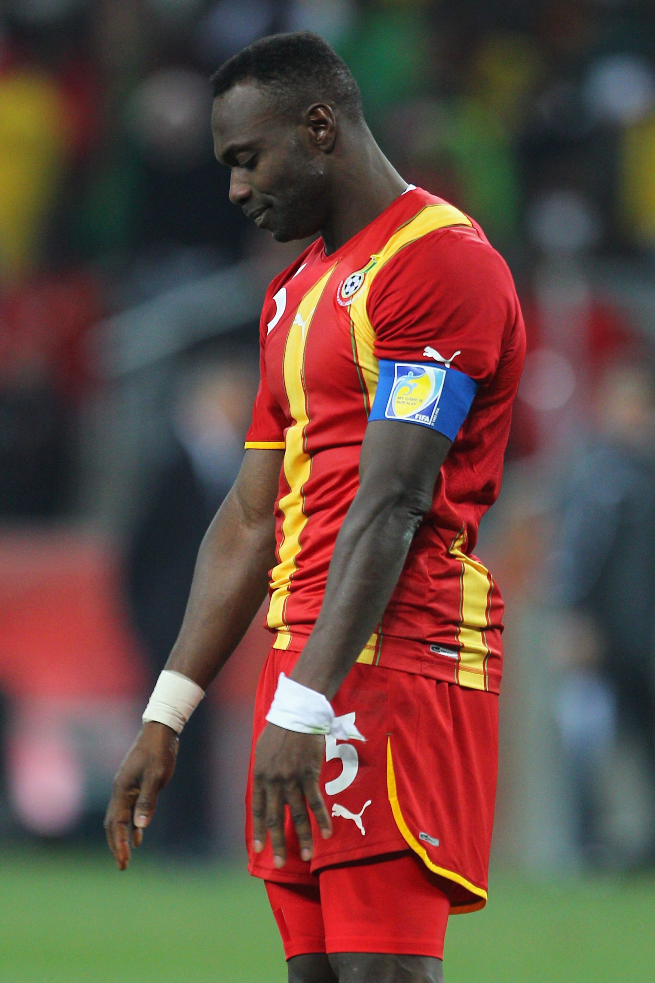 JOHANNESBURG, SOUTH AFRICA - JULY 02:  John Mensah of Ghana reacts as he misses in a penalty shoot out during the 2010 FIFA World Cup South Africa Quarter Final match between Uruguay and Ghana at the Soccer City stadium on July 2, 2010 in Johannesburg, So