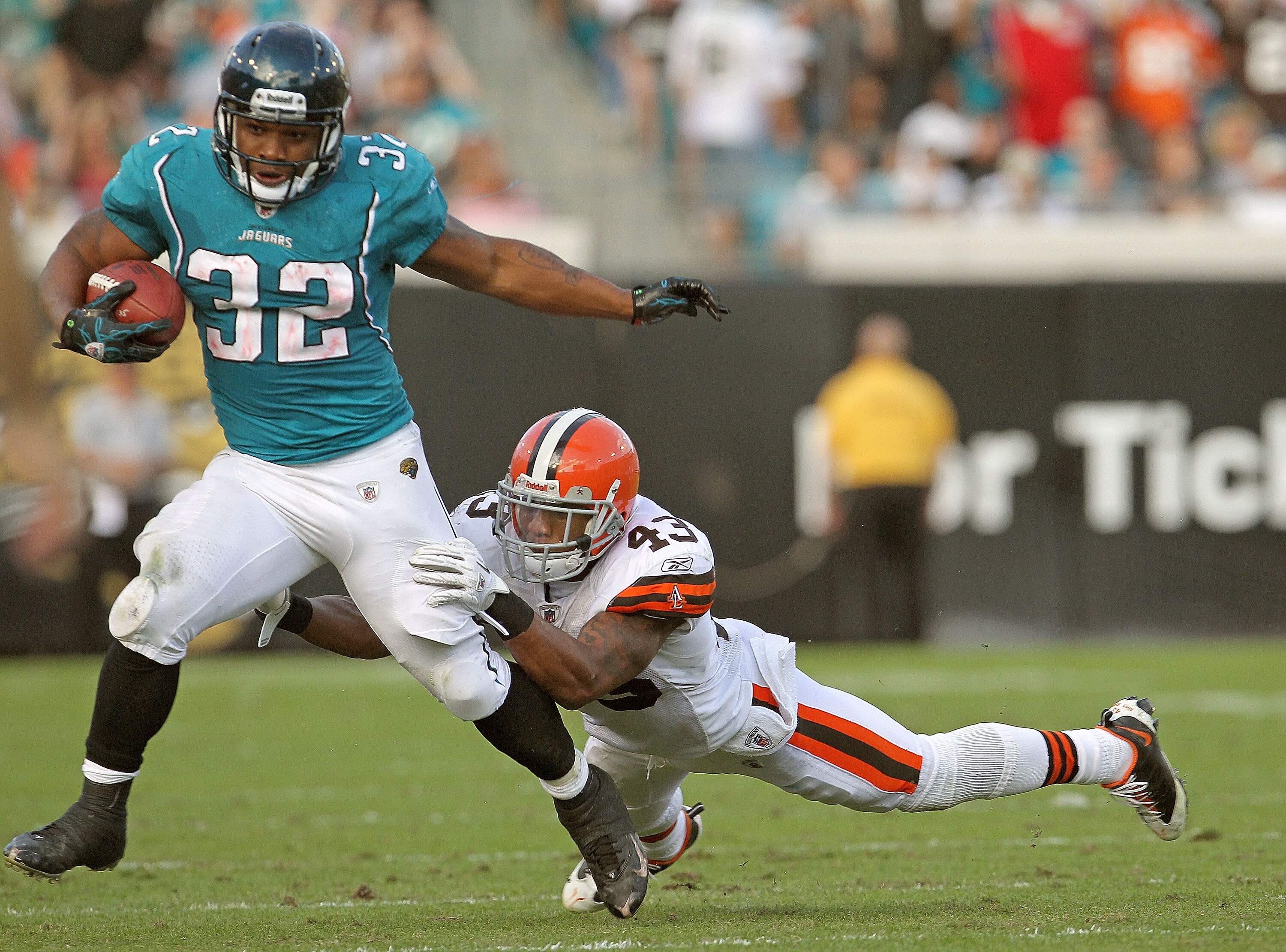 JACKSONVILLE, FL - NOVEMBER 21:  Maurice Jones-Drew #32 of the Jacksonville Jaguars is chased down by T.J. Ward #43 during a game agaisnt the Cleveland Browns at EverBank Field on November 21, 2010 in Jacksonville, Florida.  (Photo by Mike Ehrmann/Getty I