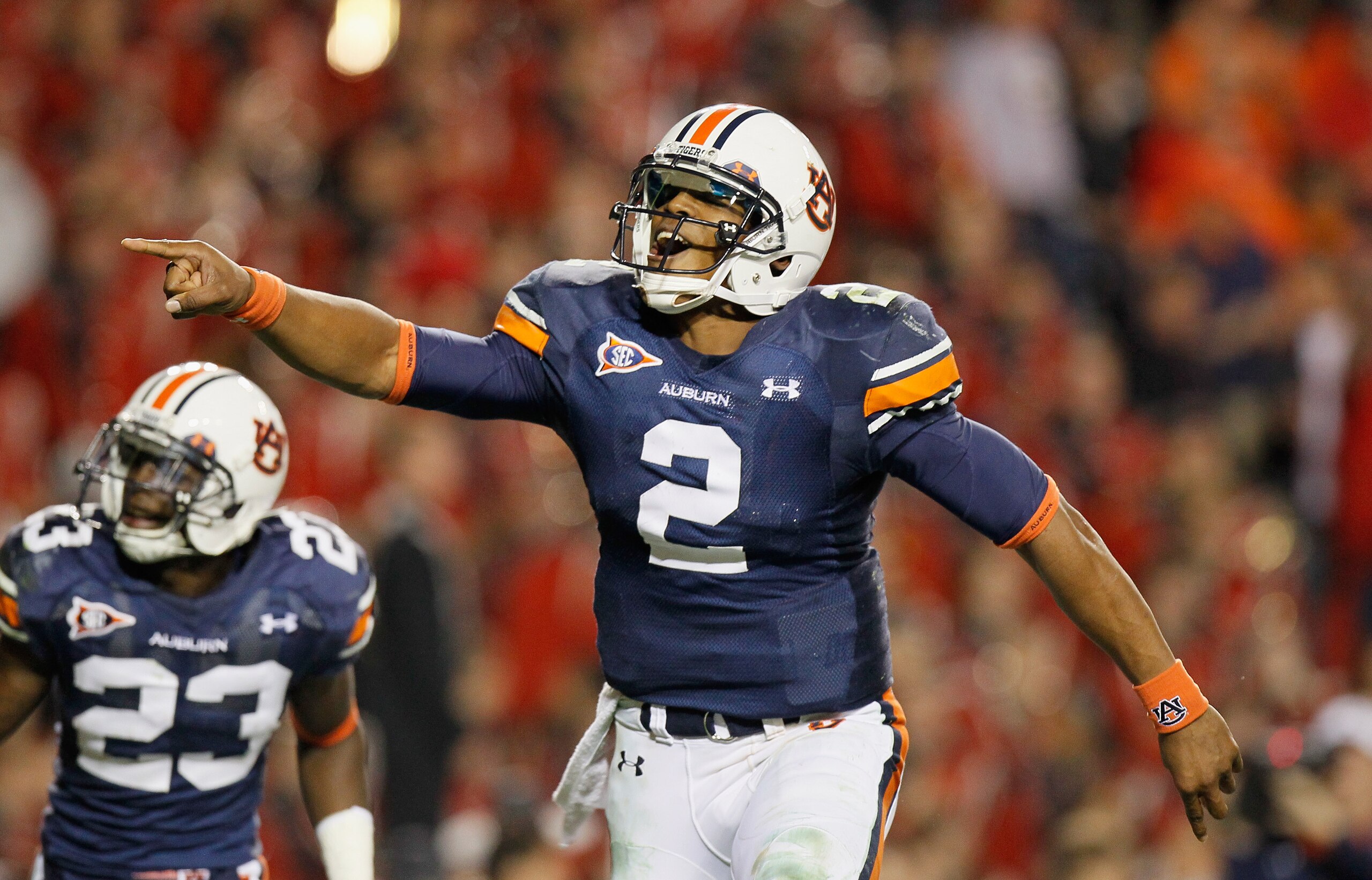 AUBURN, AL - NOVEMBER 13:  Quarterback Cameron Newton #2 of the Auburn Tigers celebrates after a touchdown against the Georgia Bulldogs at Jordan-Hare Stadium on November 13, 2010 in Auburn, Alabama.  (Photo by Kevin C. Cox/Getty Images)