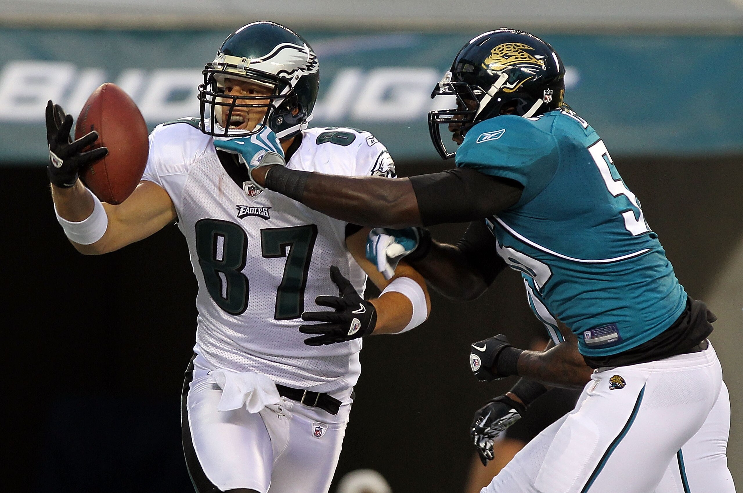 PHILADELPHIA - AUGUST 13: Brent Celek #87 of the Philadelphia Eagles has his reception broken up in the endzone by Justin Durrant #56 of the Jacksonville Jaguars during their preseason game at Lincoln Financial Field on August 13, 2010 in Philadelphia, Pe