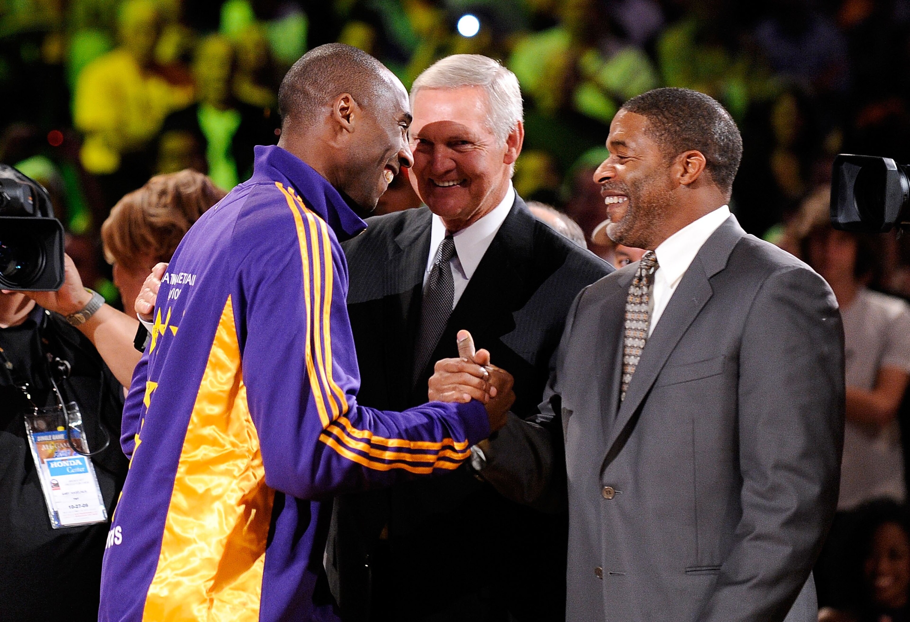 LOS ANGELES, CA - OCTOBER 27: (L-R) Kobe Bryant #24 of the Los Angeles Lakers is congratulated by former Laker champions Jerry West and Norm Nixon after receiving his 2009 NBA Championship ring before the season opening game against the Los Angeles Clipp LOS ANGELES, CA - OCTOBER 27: (L-R) Kobe Bryant #24 of the Los Angeles Lakers is congratulated by former Laker champions Jerry West and Norm Nixon after receiving his 2009 NBA Championship ring before the season opening game against the Los Angeles Clipp