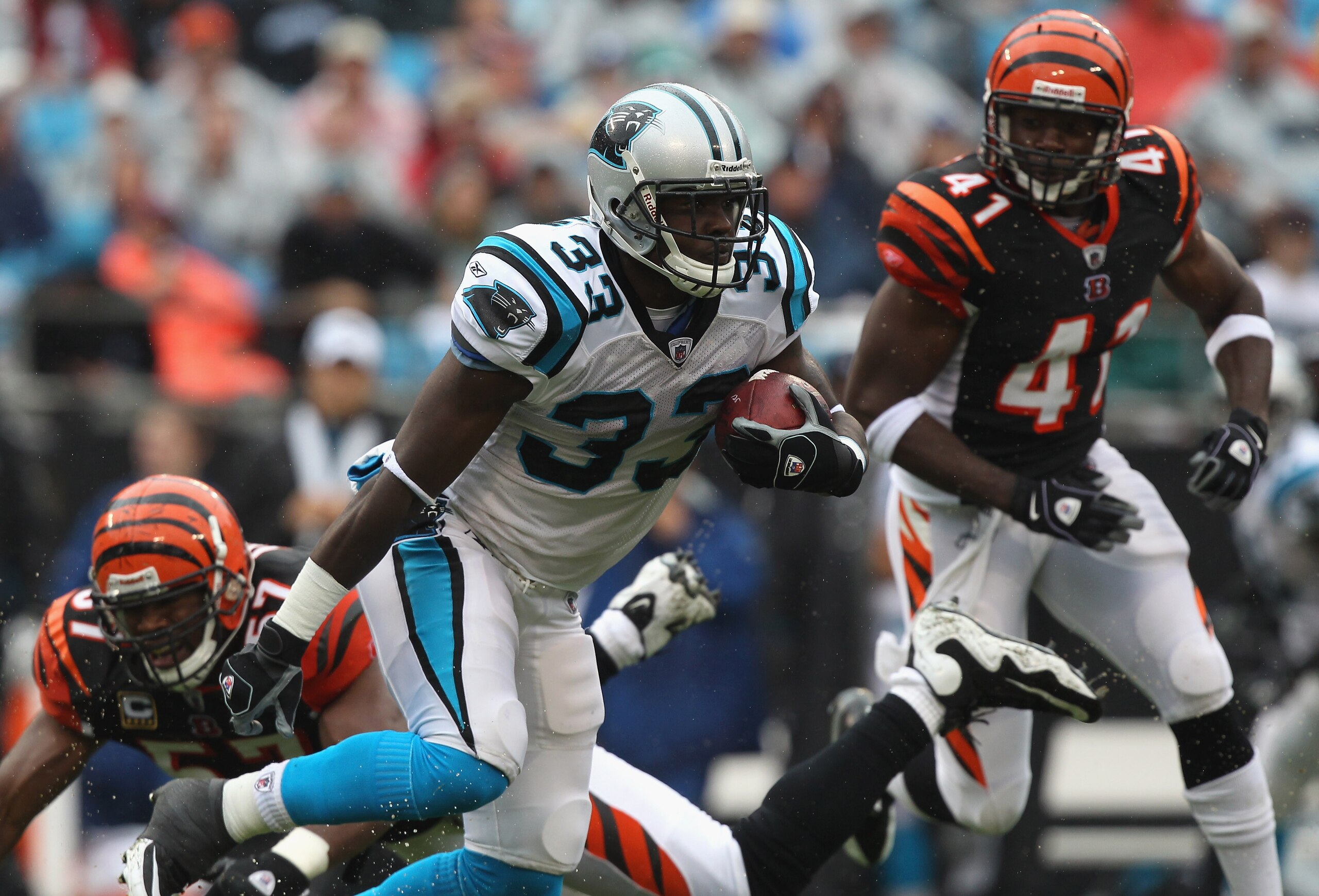 CHARLOTTE, NC - SEPTEMBER 26:  Mike Goodson #33 of the Carolina Panthers runs with the ball against the Cincinnati Bengals during their game at Bank of America Stadium on September 26, 2010 in Charlotte, North Carolina.  (Photo by Streeter Lecka/Getty Ima