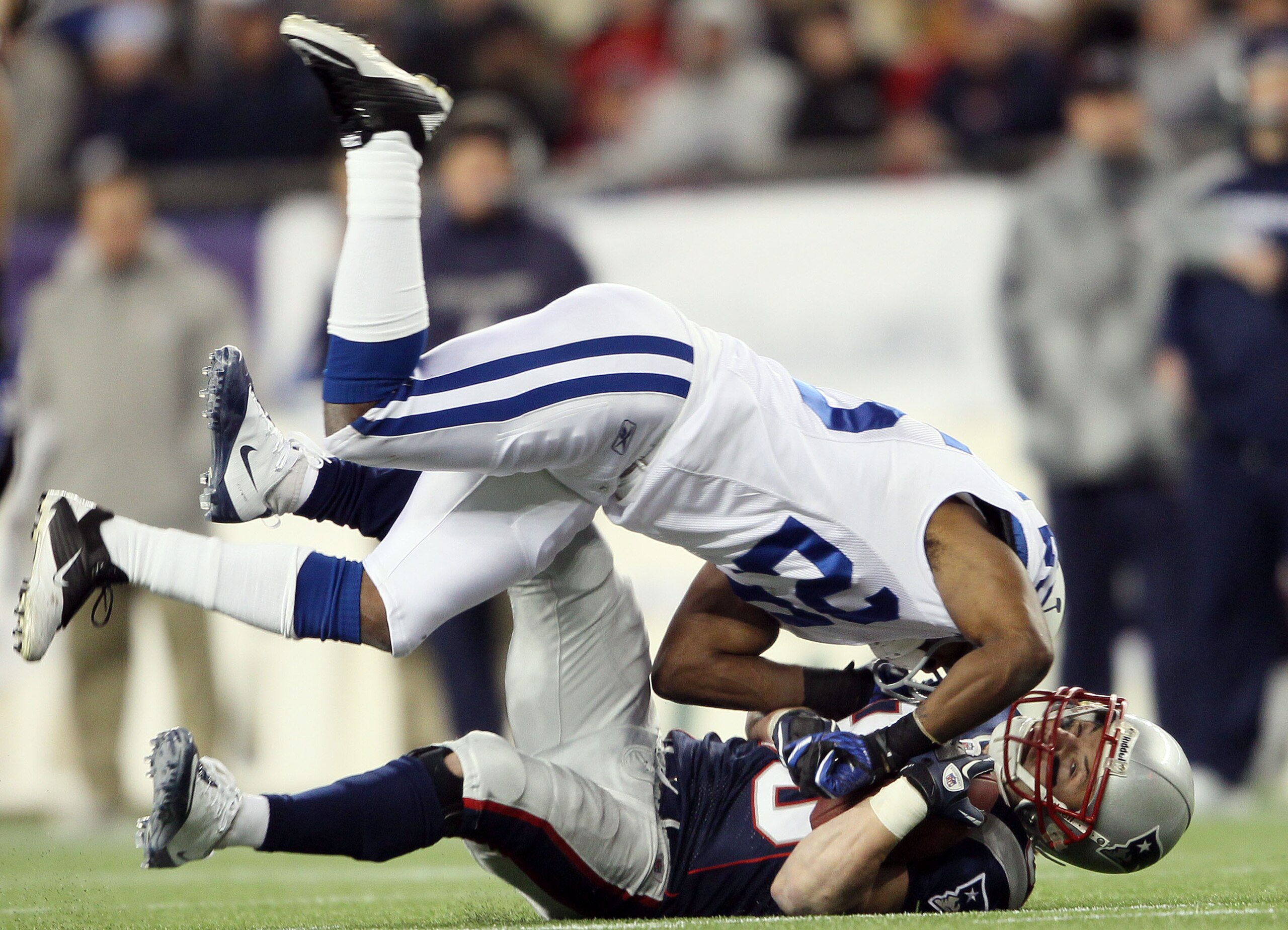 FOXBORO, MA - NOVEMBER 21:   Danny Woodhead #39 of the New England Patriots is tackled by Jerraud Powers #25 of the Indianapolis Colts on November 21, 2010 at Gillette Stadium in Foxboro, Massachusetts. The Patriots defeated the Colts 31-28. (Photo by Els