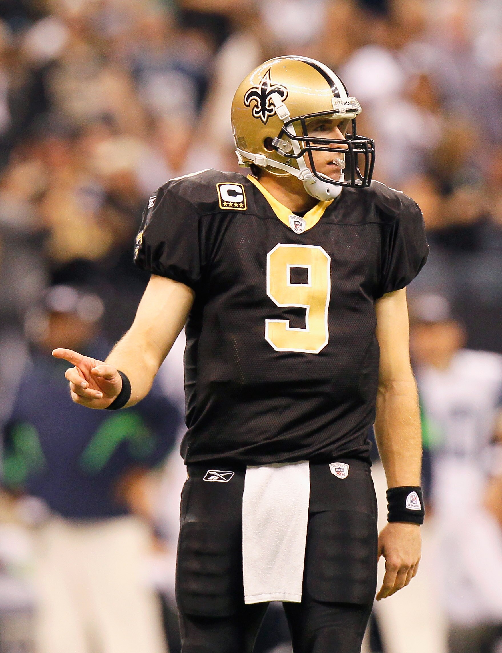 NEW ORLEANS - NOVEMBER 21:  Quarterback Drew Brees #9 of the New Orleans Saints signals a first down against the Seattle Seahawks at Louisiana Superdome on November 21, 2010 in New Orleans, Louisiana.  (Photo by Kevin C. Cox/Getty Images)