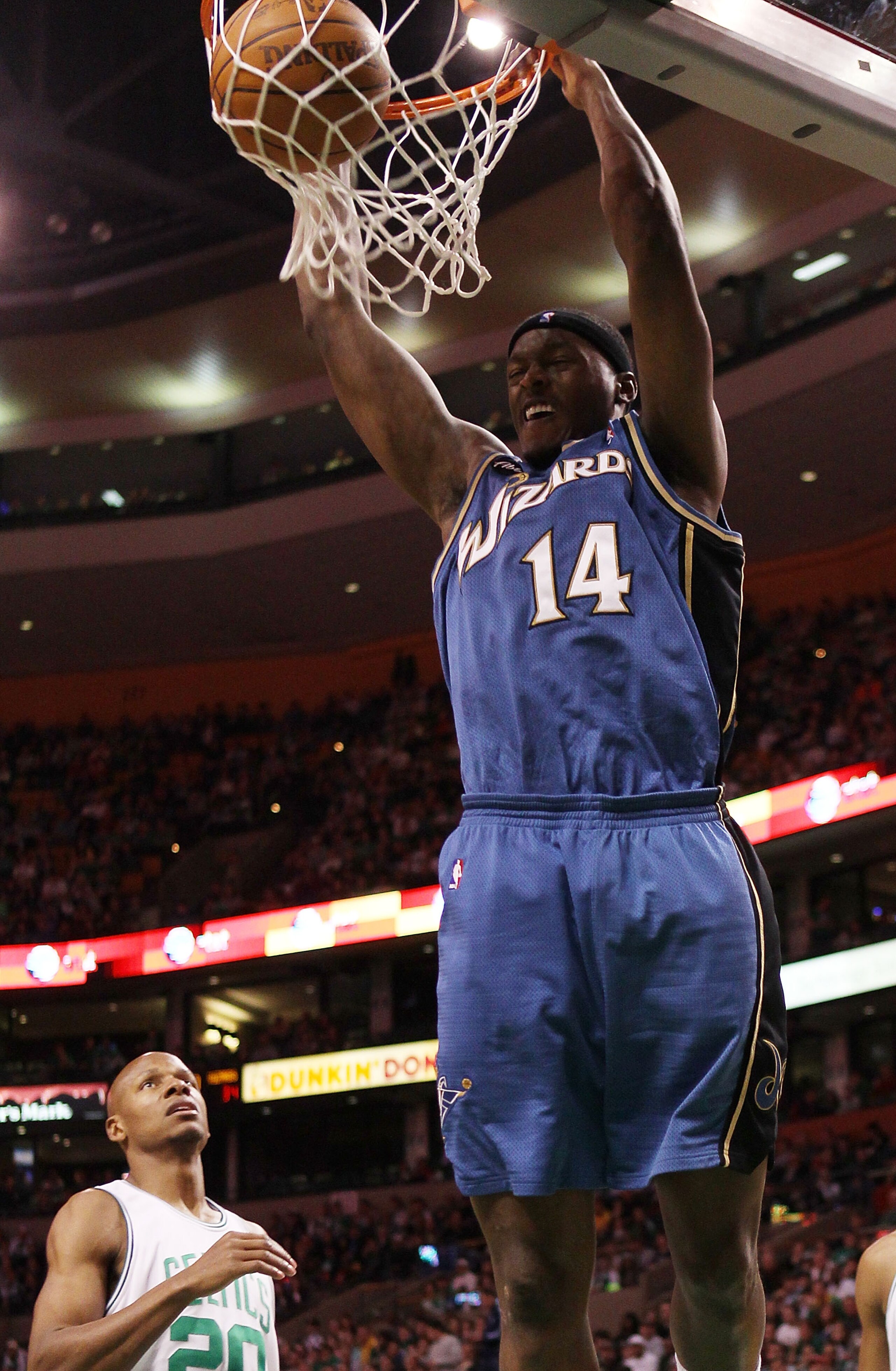 BOSTON - MARCH 07:  Al Thornton #14 of the Washington Wizards dunks the ball as Ray Allen #20 of the Boston Celtics stands by on March 7, 2010 at the TD Garden in Boston, Massachusetts.  NOTE TO USER: User expressly acknowledges and agrees that, by downlo