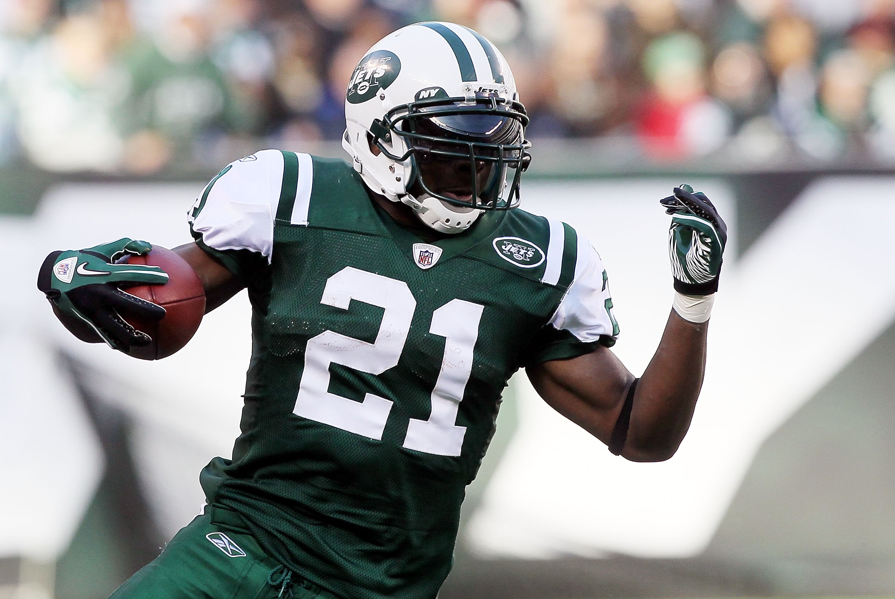 EAST RUTHERFORD, NJ - NOVEMBER 21:  LaDainian Tomlinson #21 of the New York Jets runs against the Houston Texans on November 21, 2010 at the New Meadowlands Stadium in East Rutherford, New Jersey.  (Photo by Jim McIsaac/Getty Images)