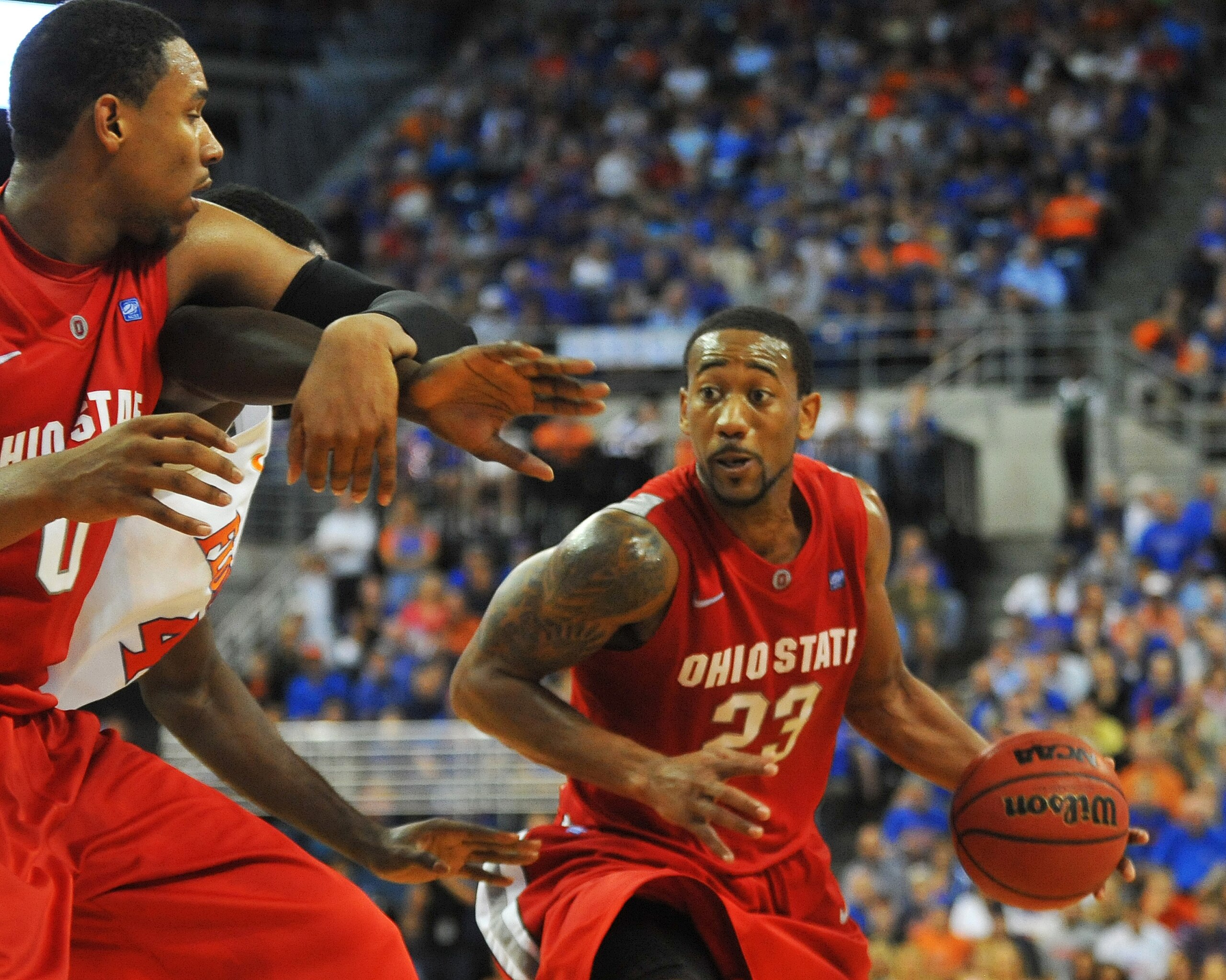 GAINESVILLE, FL - NOVEMBER 16: Guard David Lighty #23 of the Ohio State Buckeyes drives upcourt against the Florida Gators November 16, 2010 at the Stephen C. O'Connell Center in Gainesville, Florida.  (Photo by Al Messerschmidt/Getty Images)