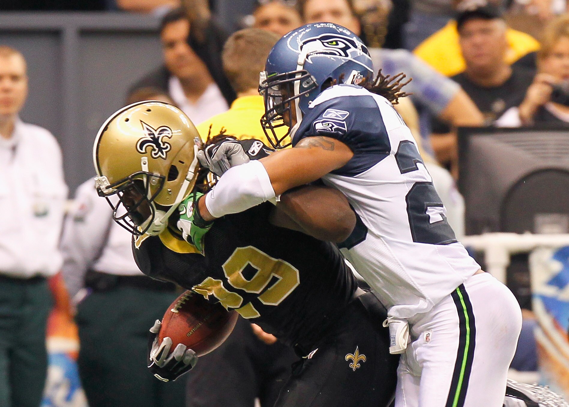 NEW ORLEANS - NOVEMBER 21:  Chris Ivory #29 of the New Orleans Saints is tackled by Walter Thurmond #28 of the Seattle Seahawks at Louisiana Superdome on November 21, 2010 in New Orleans, Louisiana.  (Photo by Kevin C. Cox/Getty Images)
